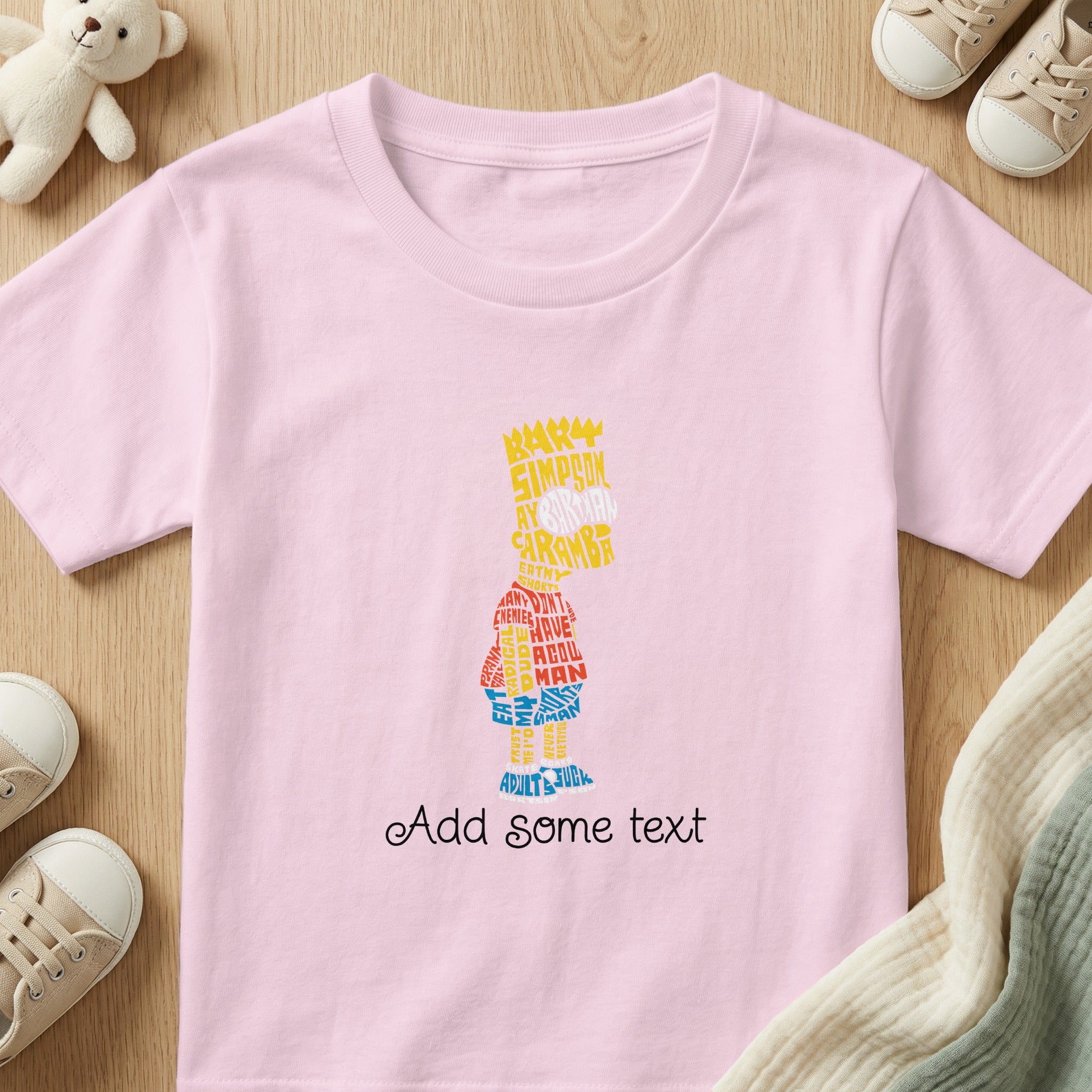 Pink t-shirt with Bart Simpson made of text, including "Bart Simpson" and "Eat my shorts".