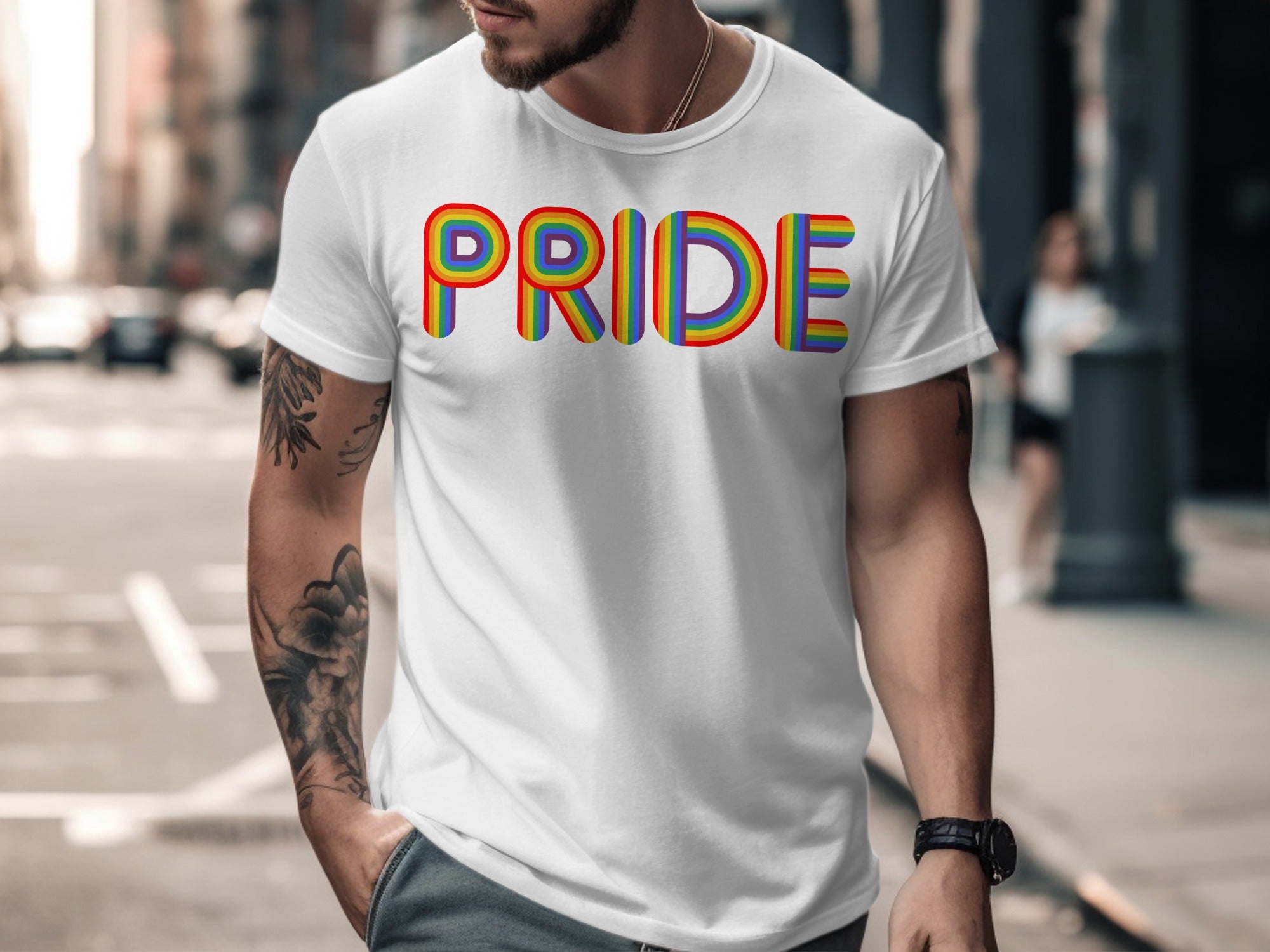 White t-shirt with "PRIDE" written in colorful rainbow letters.