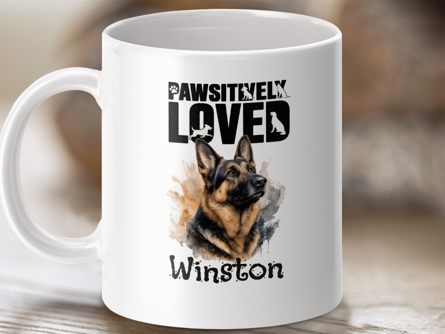 White mug with "Pawsitively Loved Winston" text and German Shepherd portrait.