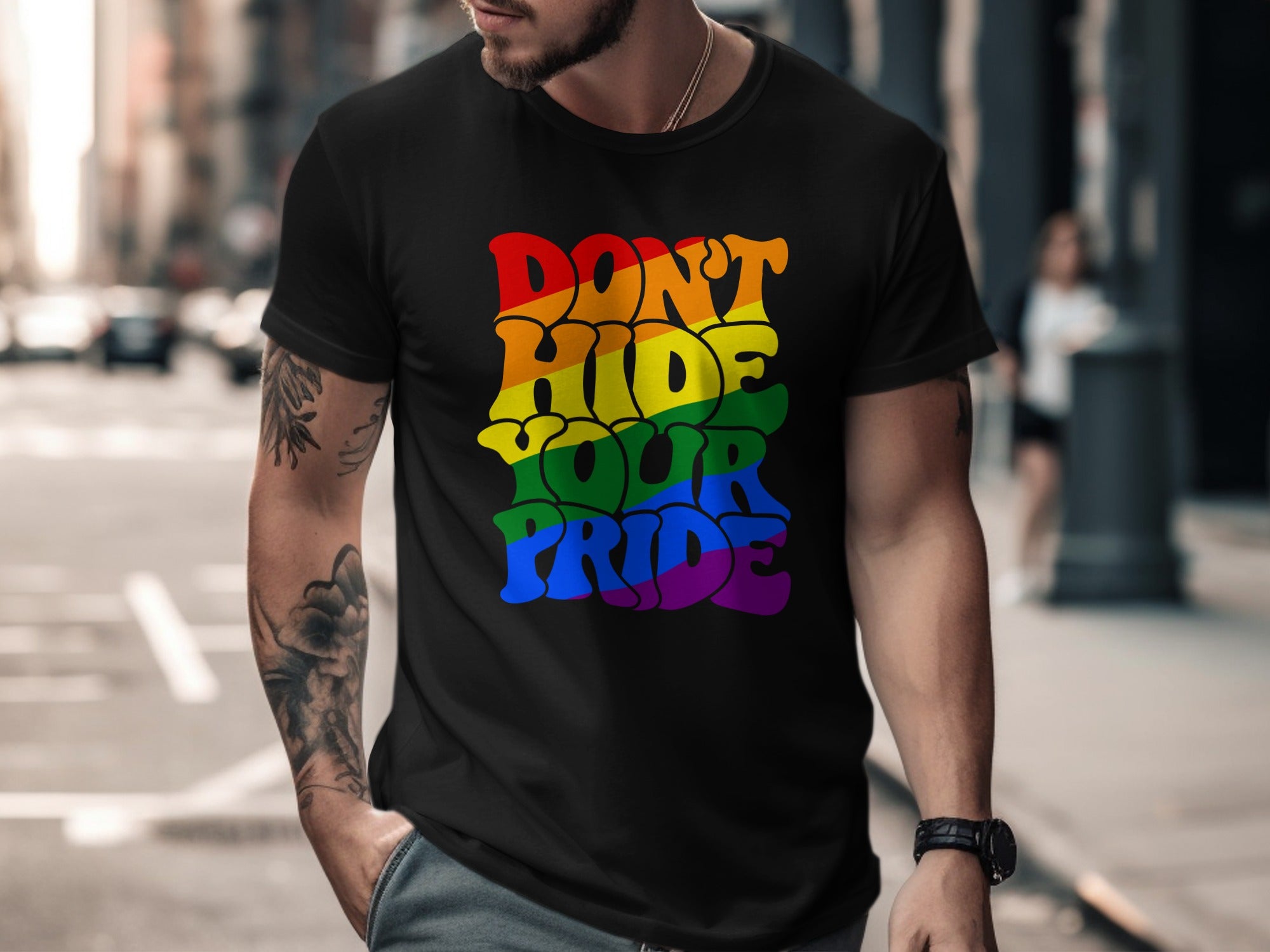 Black t-shirt with rainbow text "DON'T HIDE YOUR PRIDE"