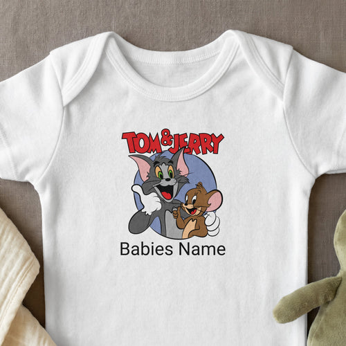 Tom and Jerry cartoon characters on a white baby onesie with "Babies Name" text.