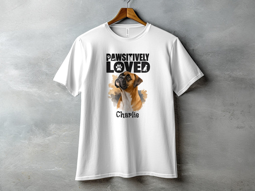 White t-shirt with "Pawsitively Loved" text, a boxer dog portrait, and name "Charlie".