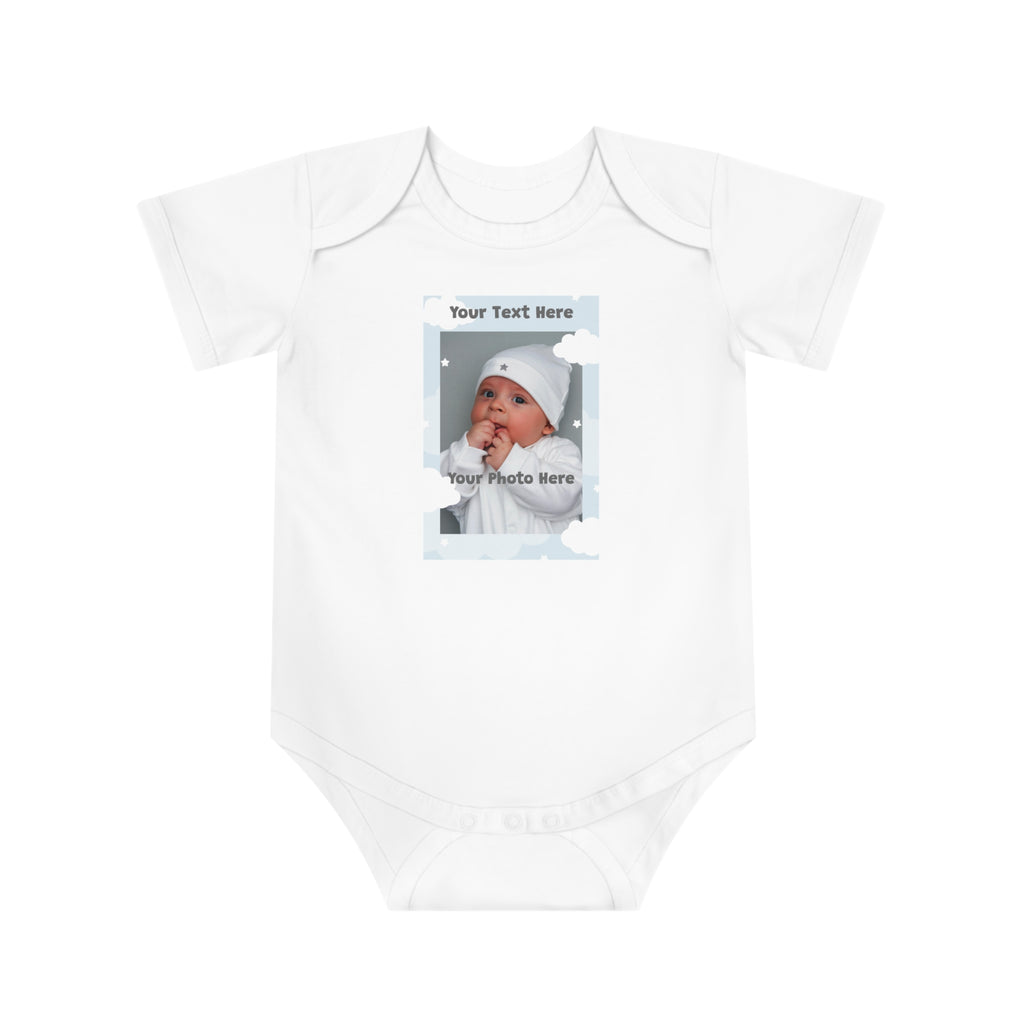 White baby onesie with a customizable photo frame featuring a baby and celestial accents.