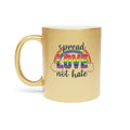 Gold mug with rainbow "LOVE" and "spread love not hate" text and clouds.