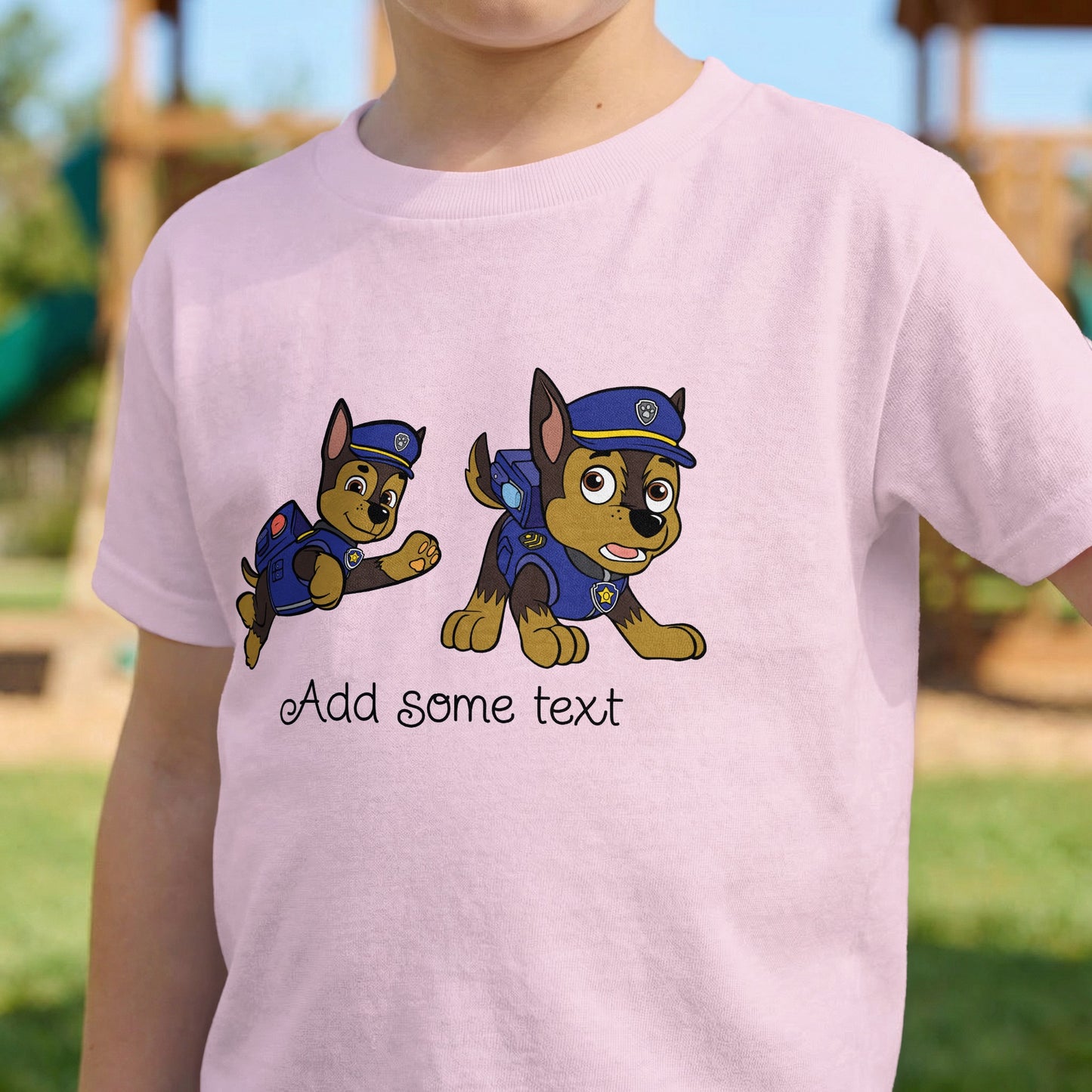 Pink t-shirt with cartoon police dogs and text placeholder.