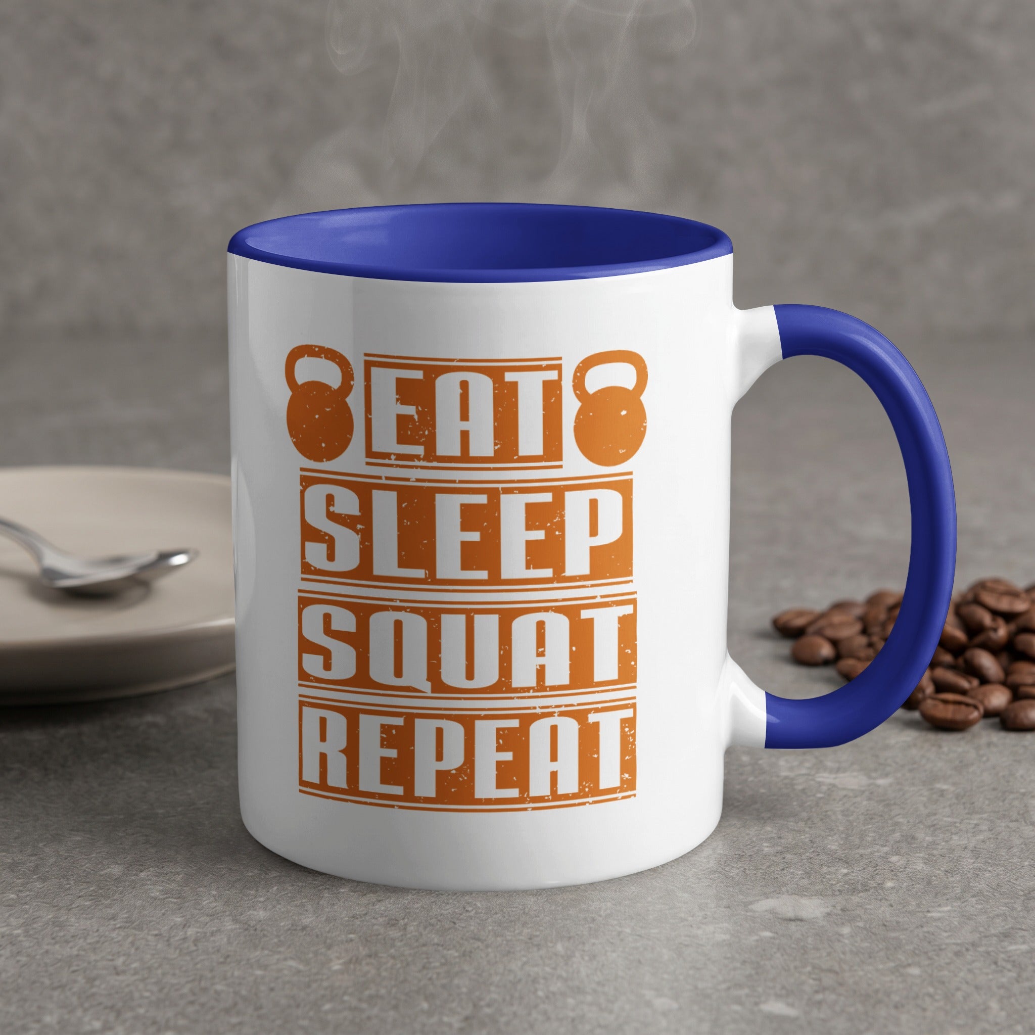 White mug with blue handle, "EAT SLEEP SQUAT REPEAT" text.
