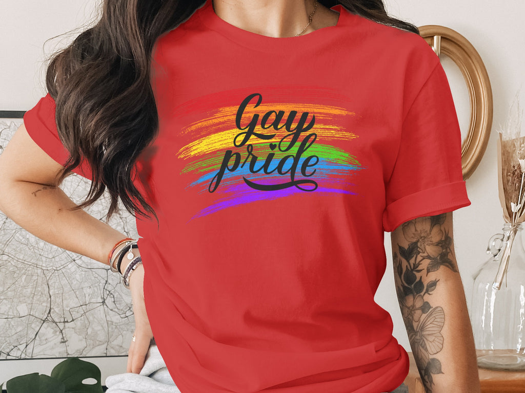 Red t-shirt with "Gay pride" text over rainbow brushstrokes.