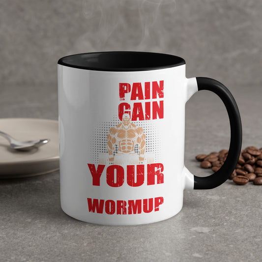 White mug with black rim, "Pain Gain Your Warmup" text, and muscular figure.