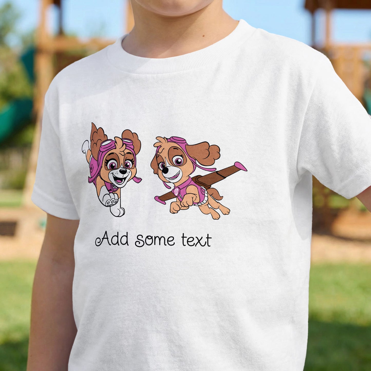 White t-shirt with two animated dogs wearing pilot gear and pink accessories.