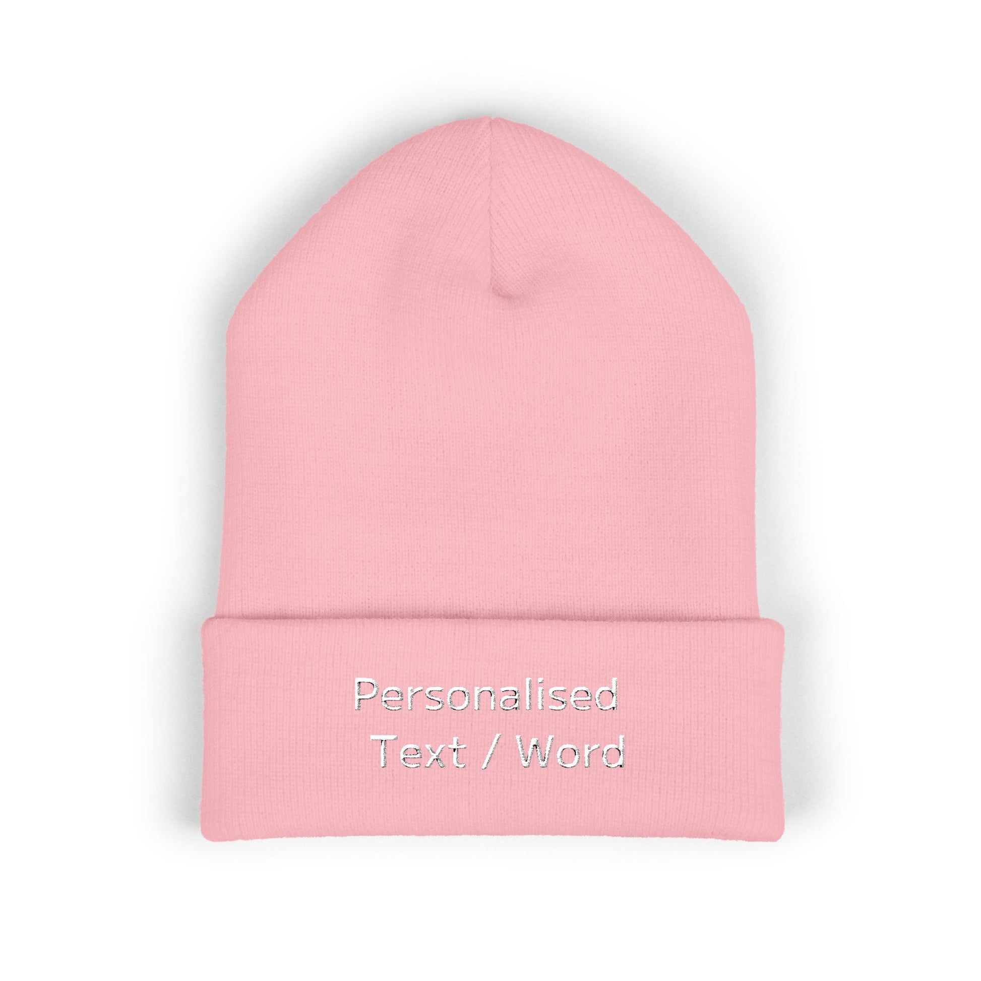 Pink knitted beanie with "Personalised Text / Word" embroidered on the cuff.