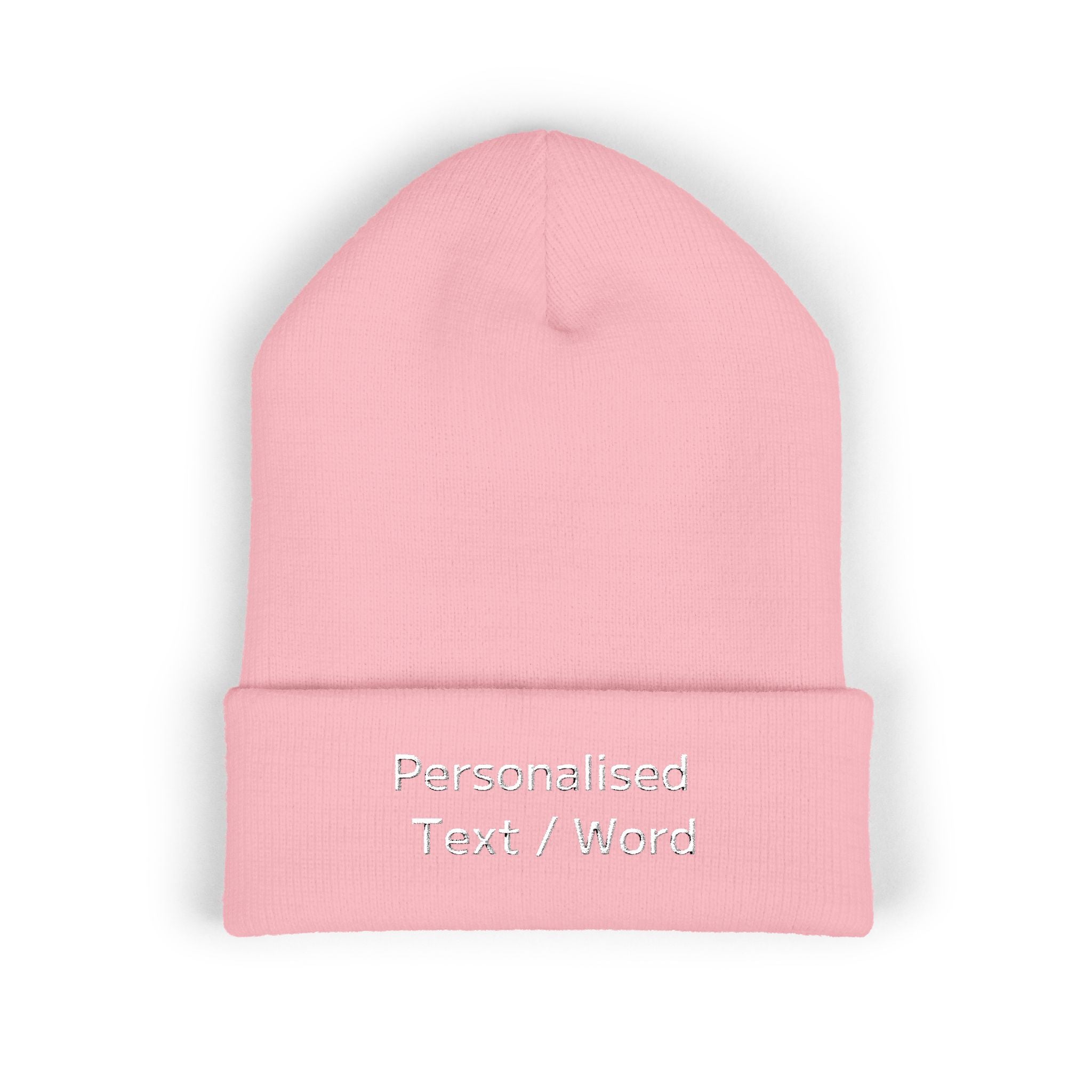 Pink knitted beanie with "Personalised Text / Word" embroidered on the cuff.