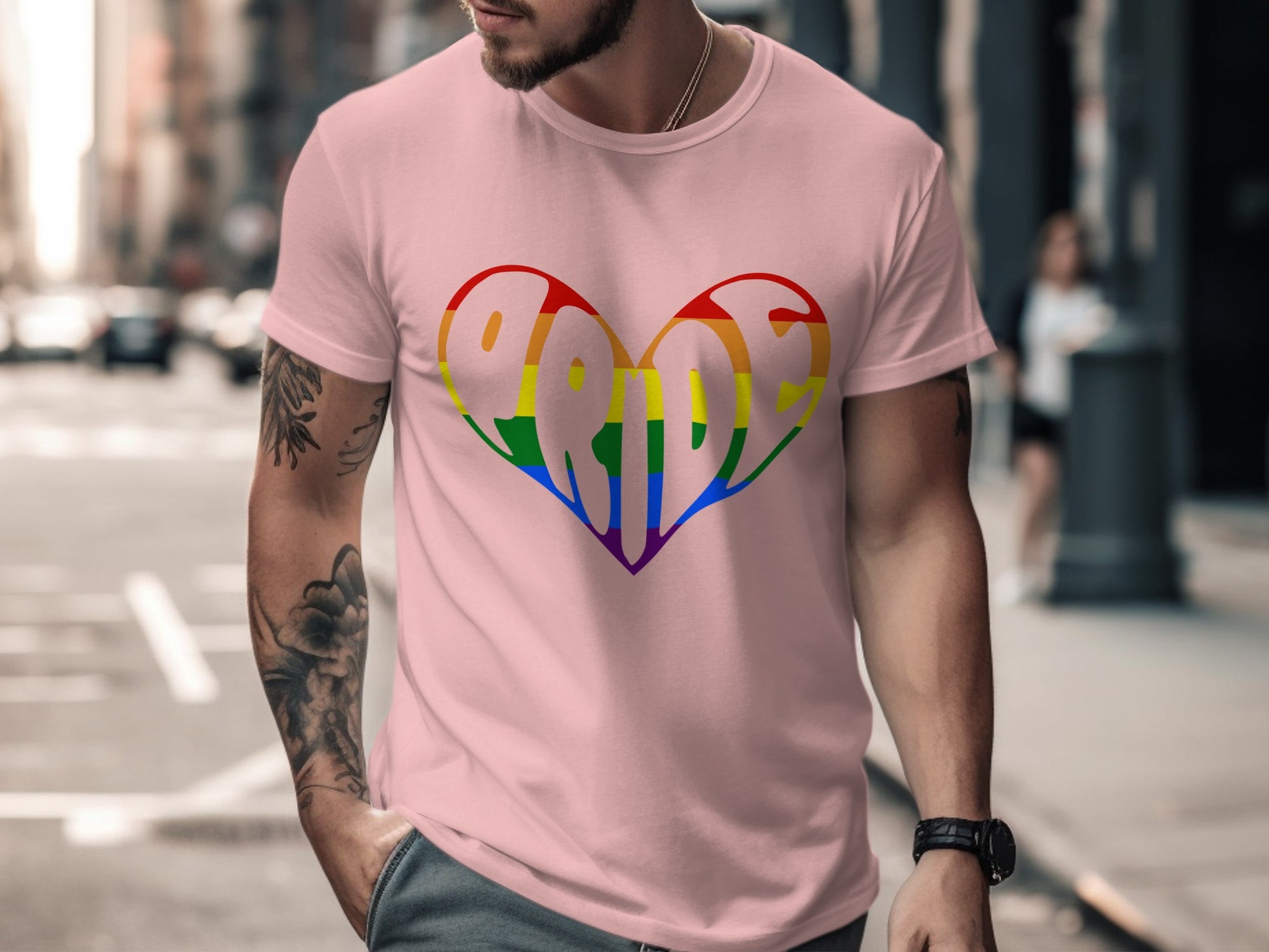 Pink t-shirt with a rainbow heart design spelling "PRIDE" on the front.