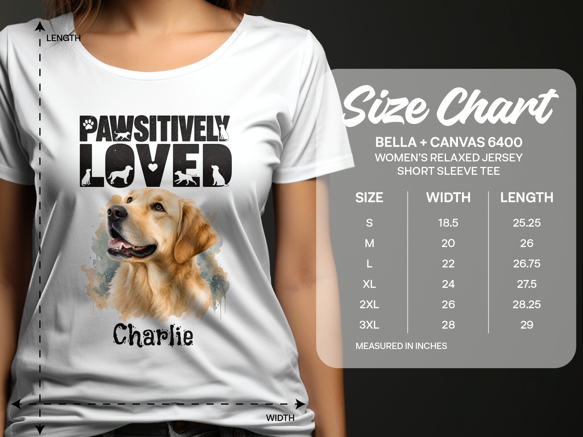 White t-shirt with "Pawsitively Loved" graphic, golden retriever, and size chart.