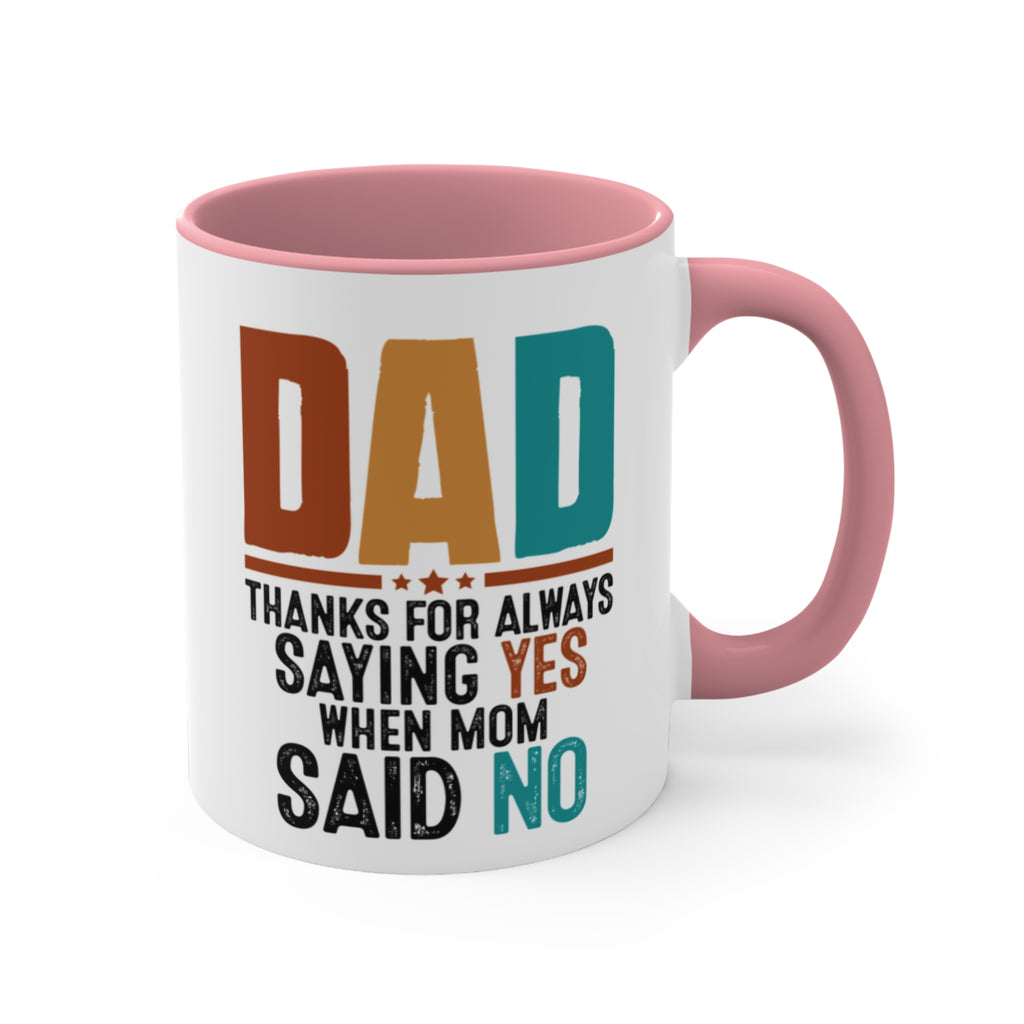 Dad mug with a pink handle and rim, text reads "DAD THANKS FOR ALWAYS SAYING YES WHEN MOM SAID NO".