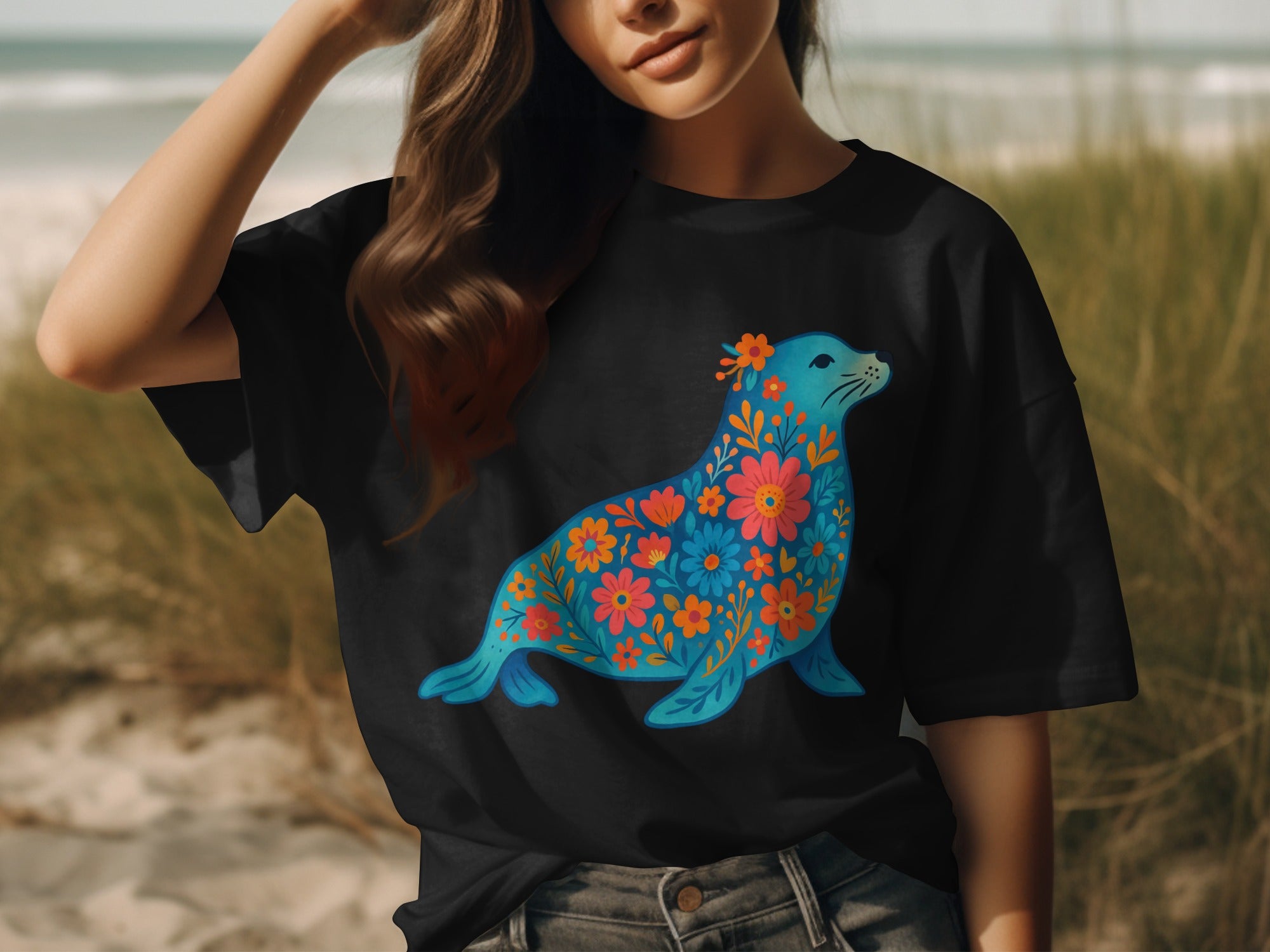 Black t-shirt with a blue seal design adorned with colorful floral patterns.