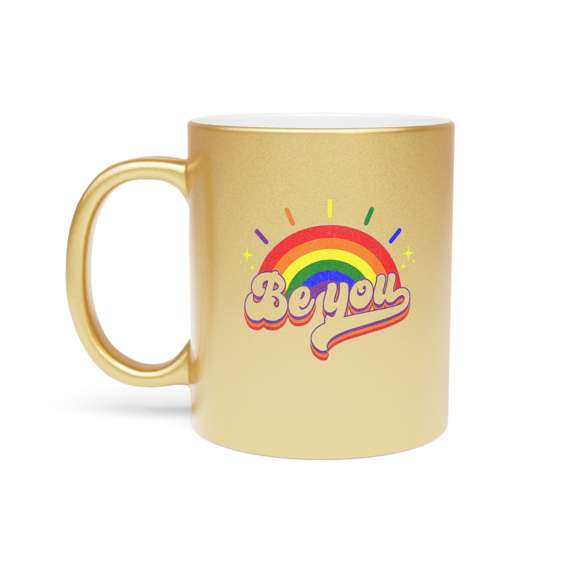 Gold mug with rainbow and "Be you" text and sparkle details.