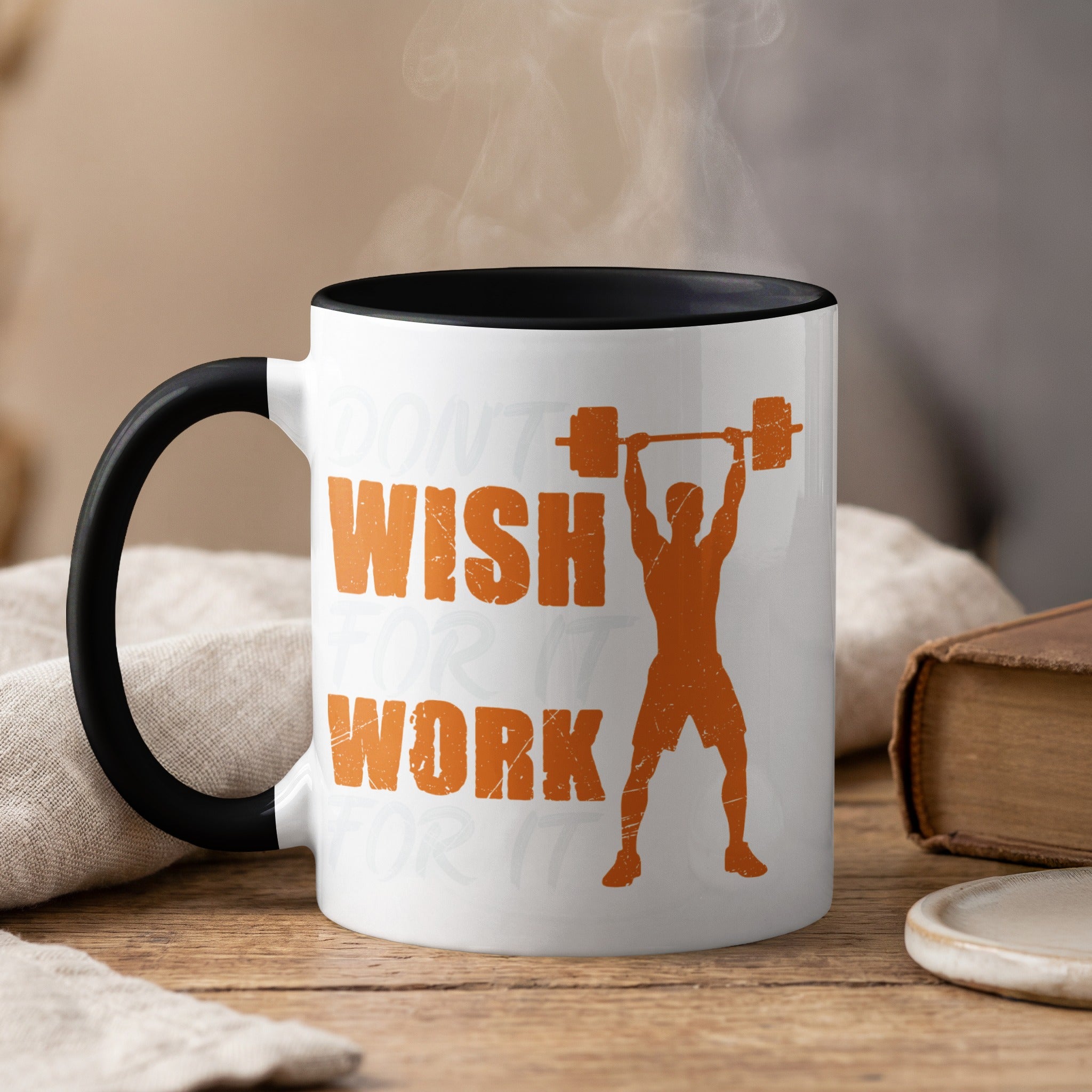 Mug with orange barbell silhouette and text "Don't wish for it, work for it."