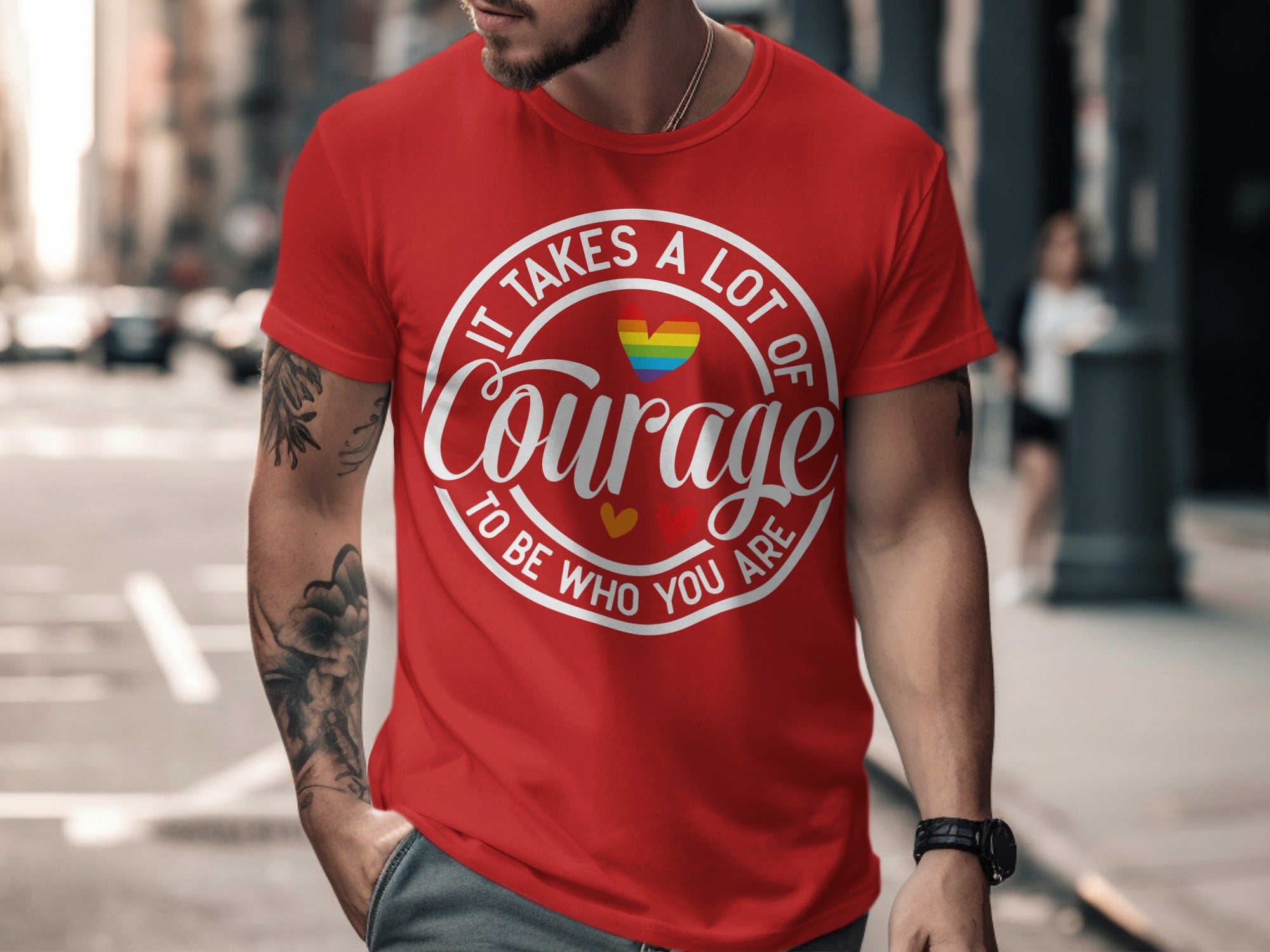 Red t-shirt with "It Takes A Lot Of Courage To Be Who You Are" text and rainbow heart.