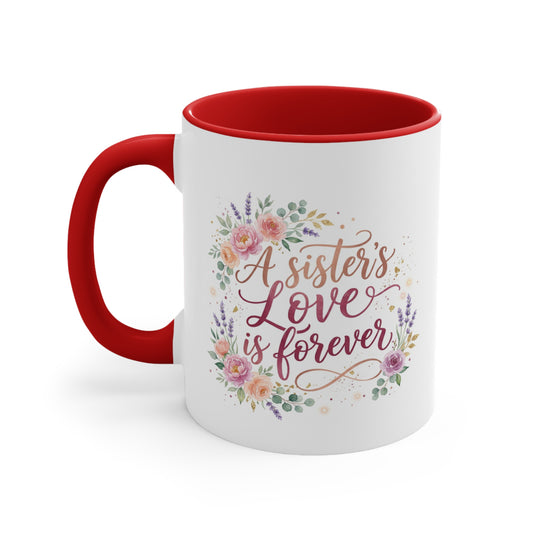 White mug with red interior and handle, featuring floral design and "A sister's love is forever" text.