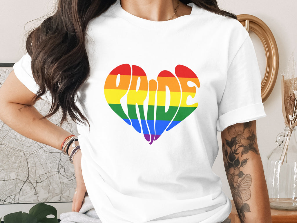 White t-shirt with rainbow heart graphic spelling "PRIDE".
