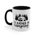White mug with black handle and interior, featuring trees and camper with text "I'd Rather Be Camping".
