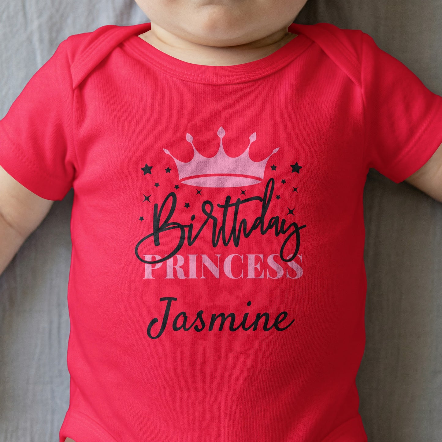 Red baby onesie with "Birthday Princess Jasmine" and a crown graphic.