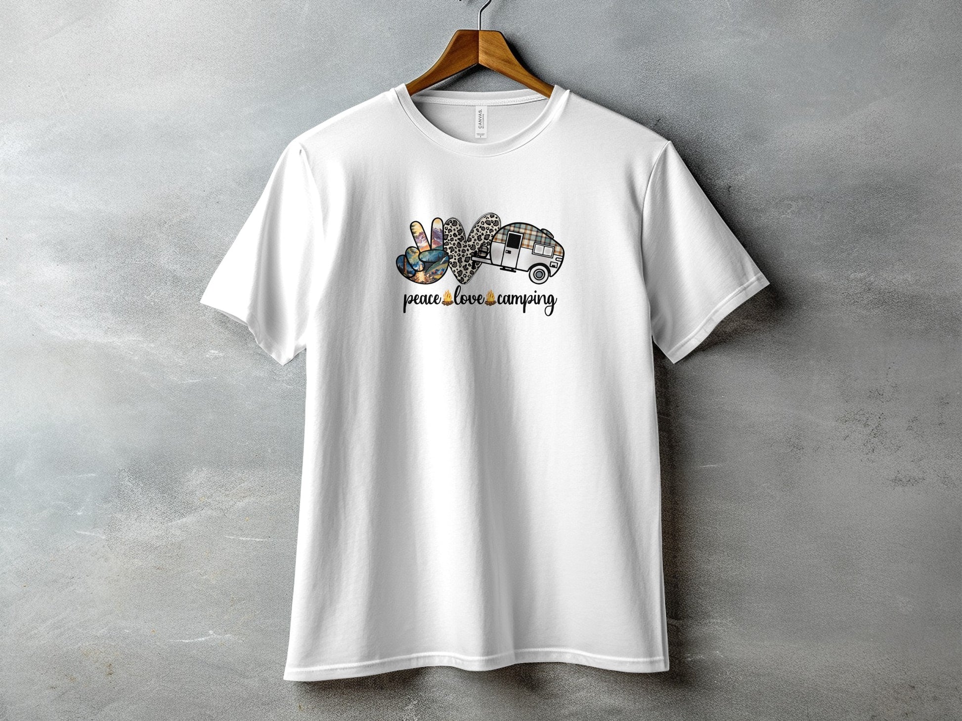 White t-shirt with graphic art featuring peace sign, heart, camper, and text.