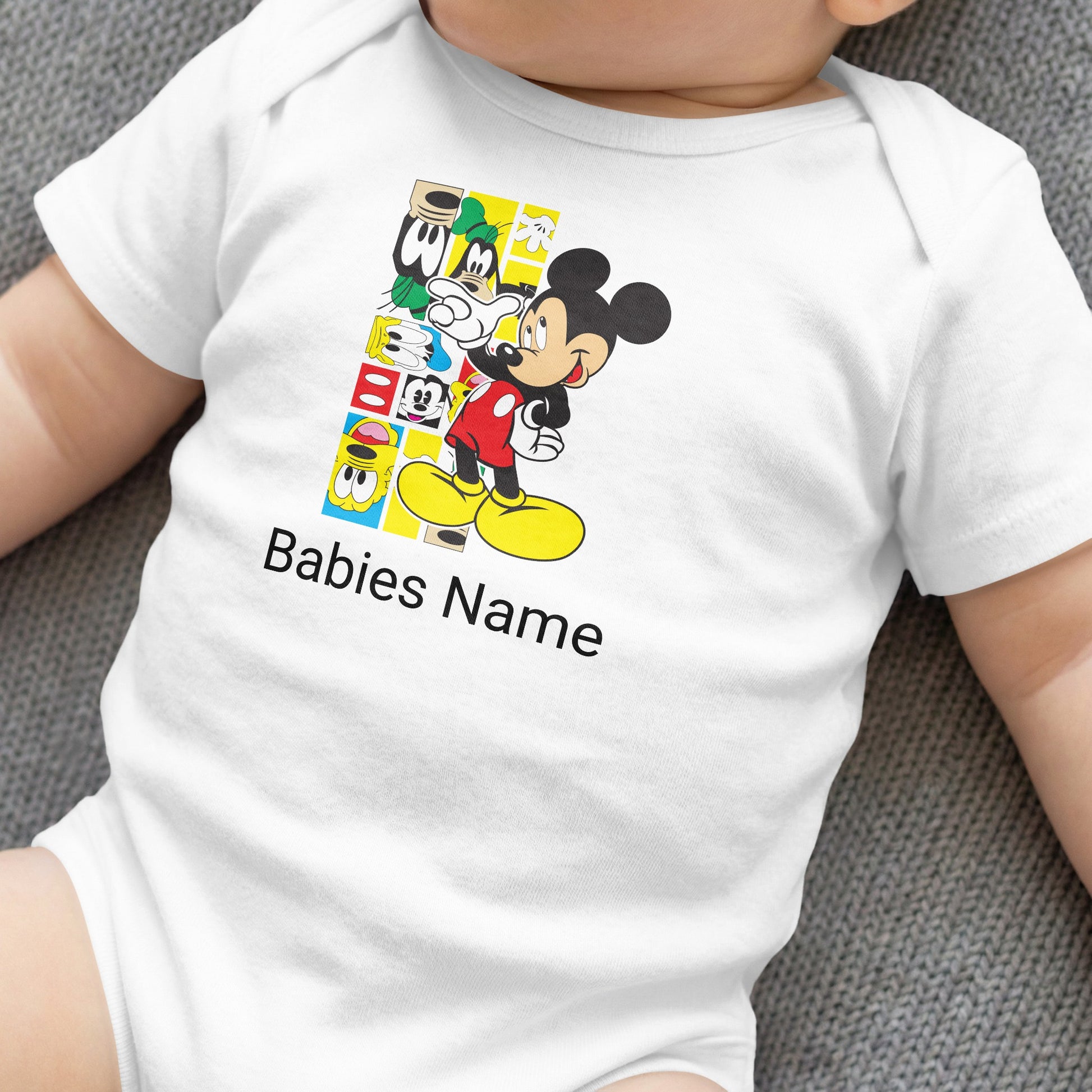 White baby onesie with Mickey Mouse graphic and "Babies Name" text.