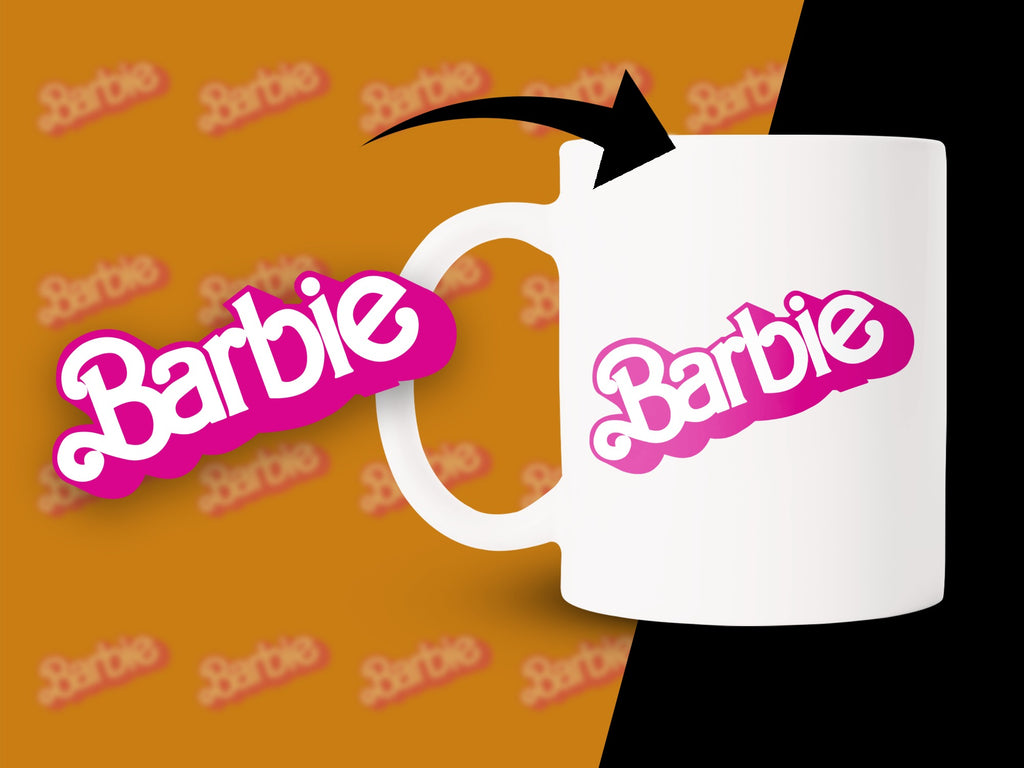 White mug with the pink Barbie logo and an arrow indicating its placement.