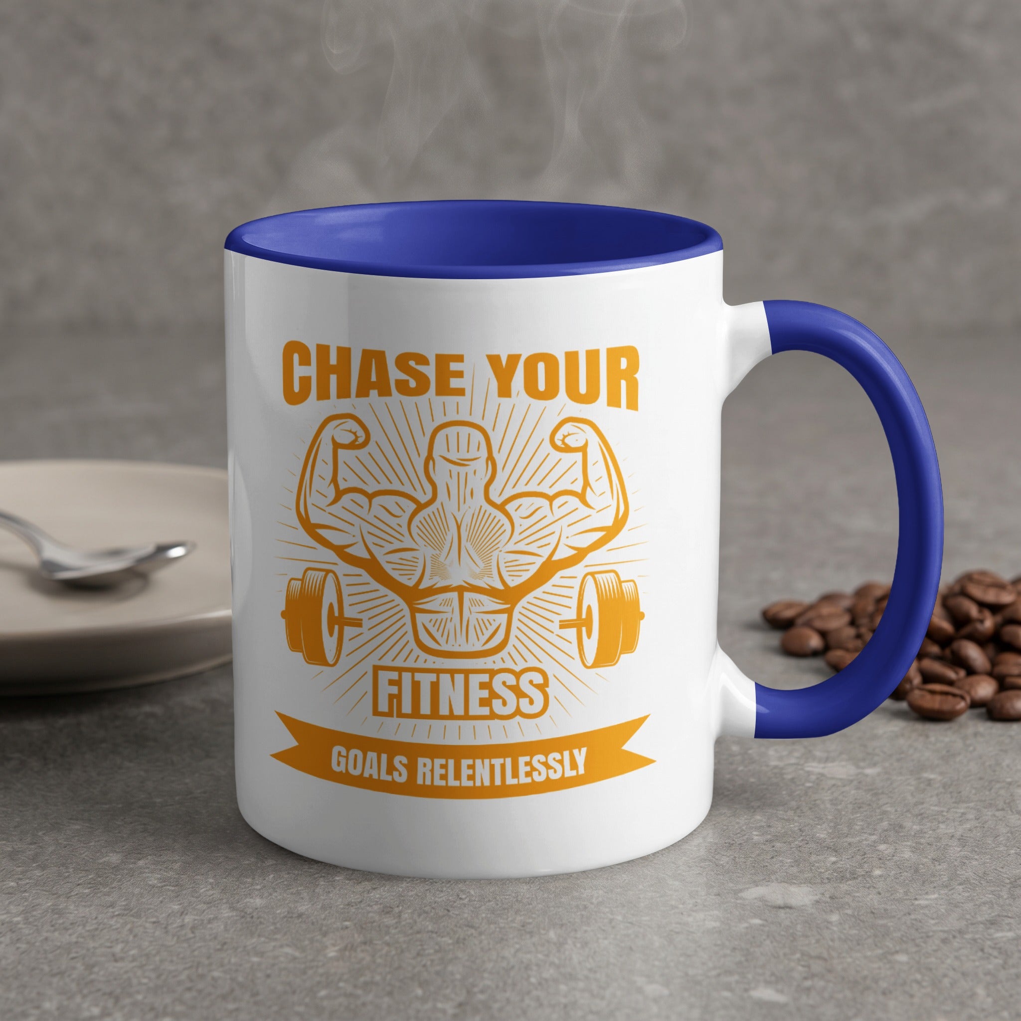 White mug with blue handle, featuring "CHASE YOUR FITNESS GOALS RELENTLESSLY" text and barbell graphic.