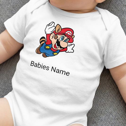 White baby onesie with Mario character and "Babies Name" text.