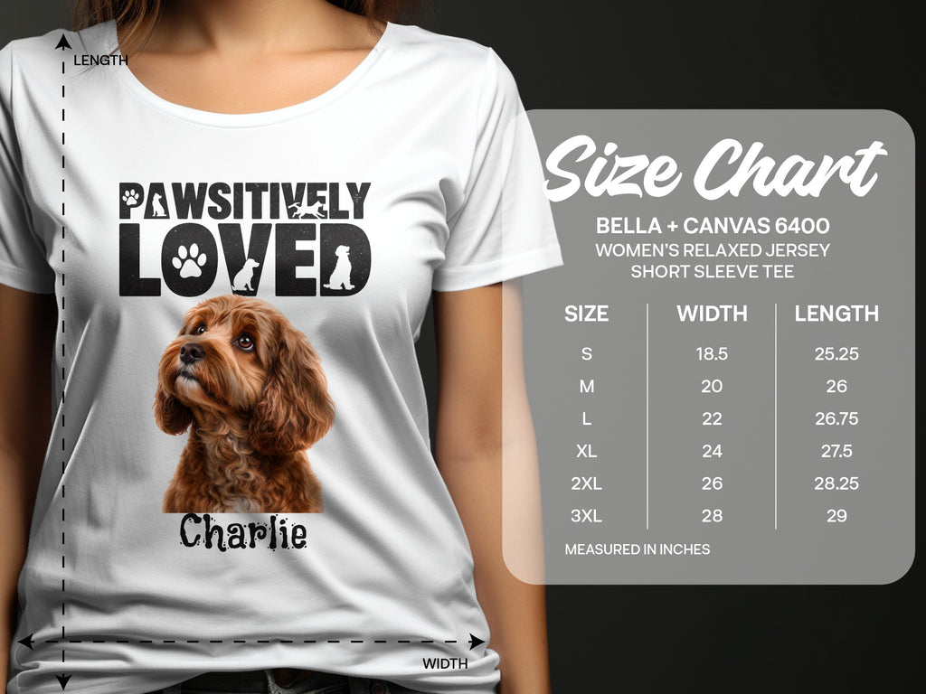 White t-shirt with "Pawsitively Loved" and dog graphic. Size chart included.