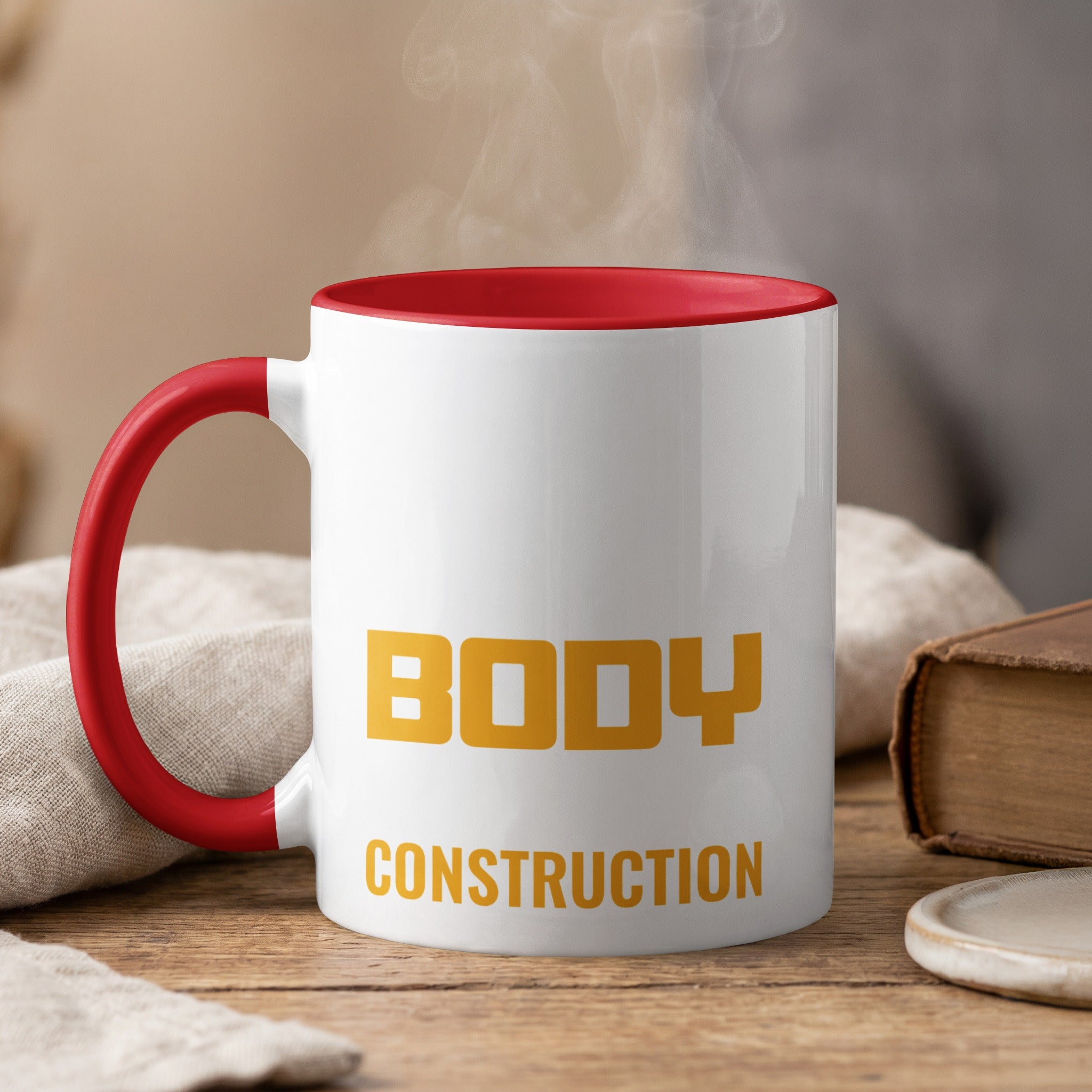 White mug with red handle and "BODY CONSTRUCTION" text.