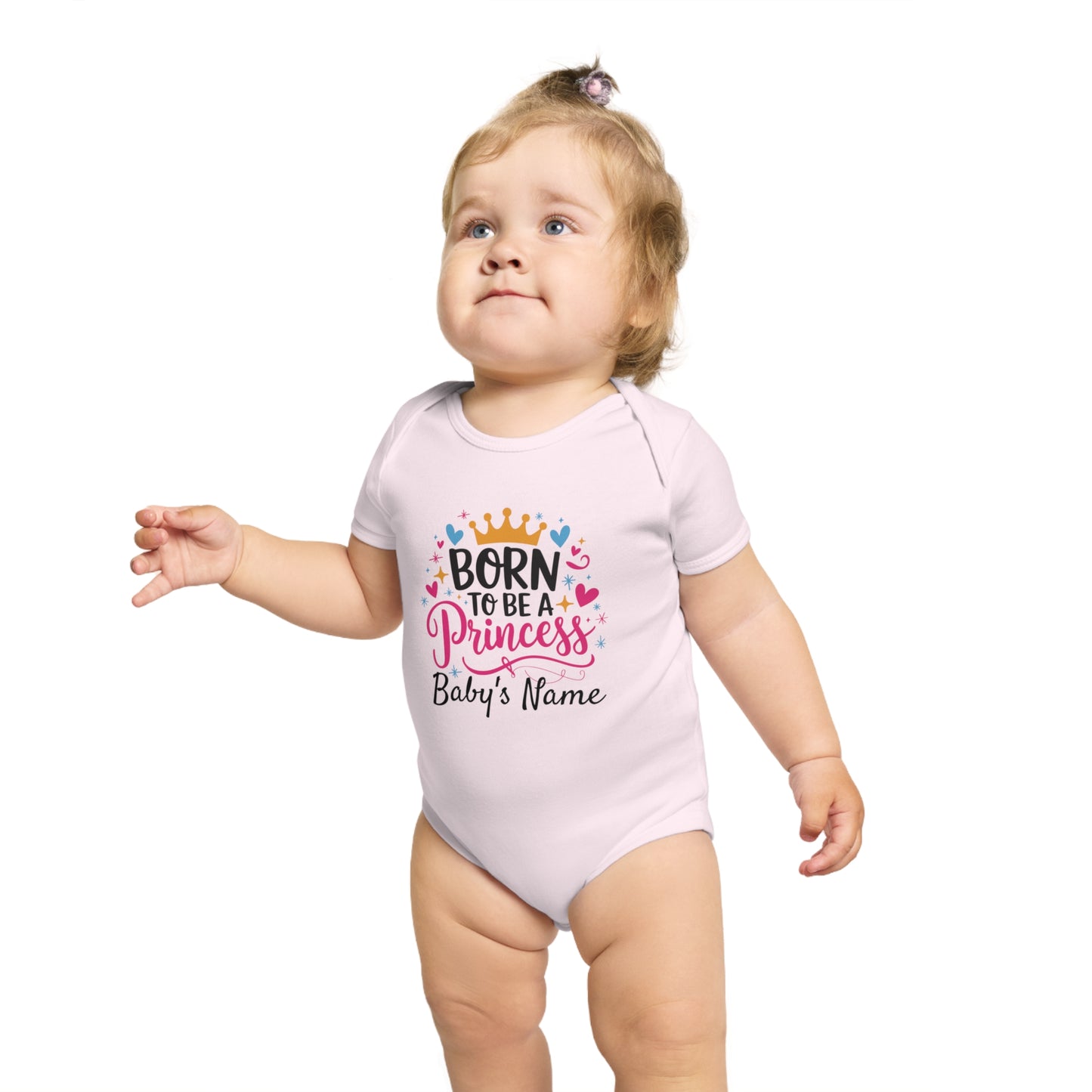 Baby wearing "Born to be a Princess" onesie with placeholder for name.