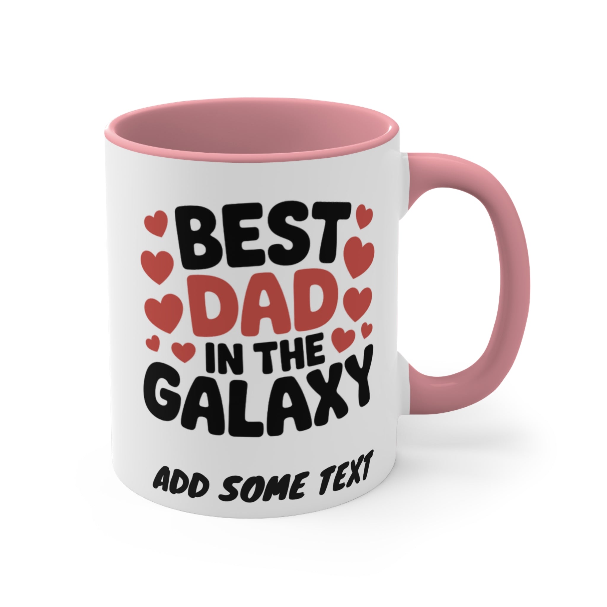 White mug with pink handle, "BEST DAD IN THE GALAXY" text and hearts.