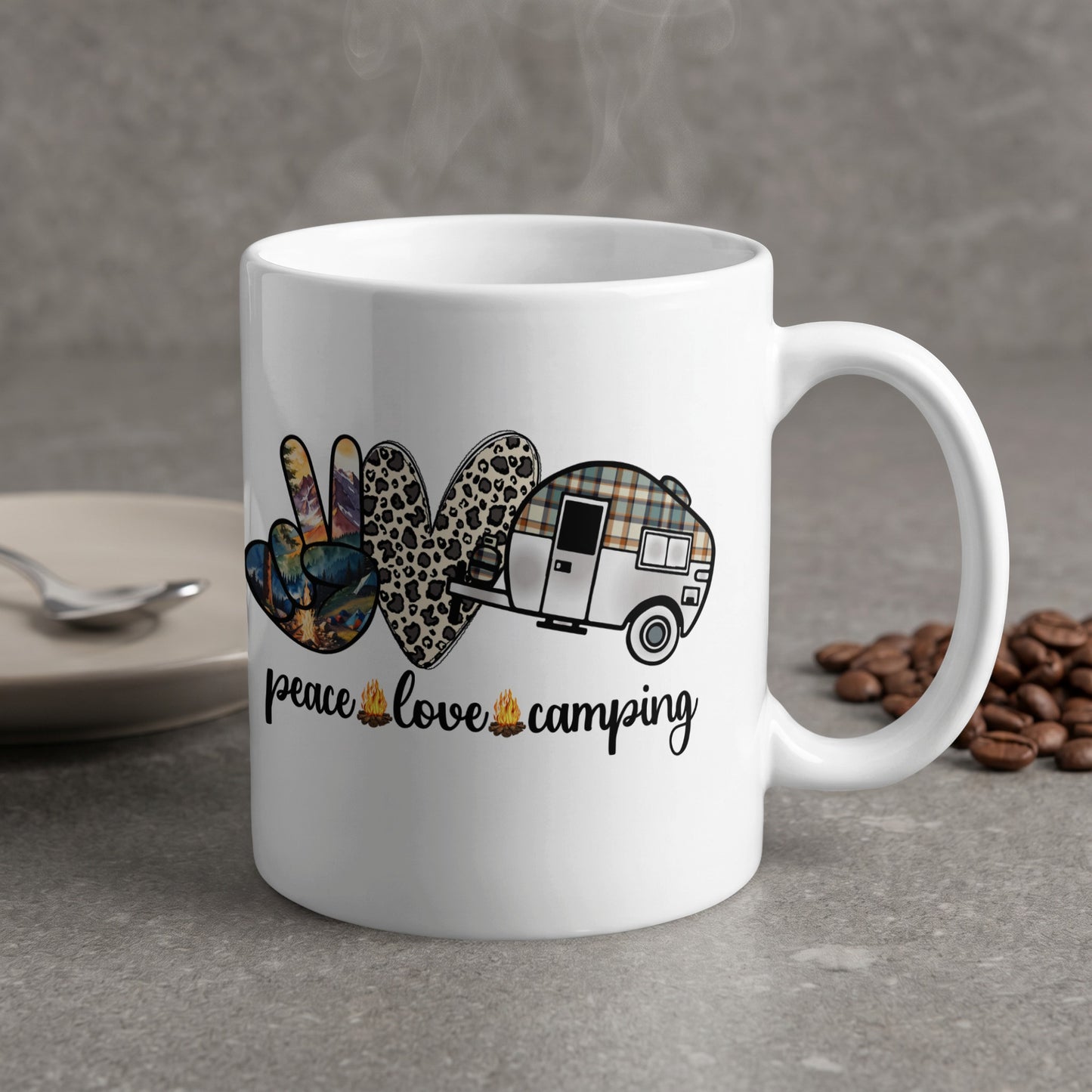 Mug with peace, love, camping graphic and steam rising.