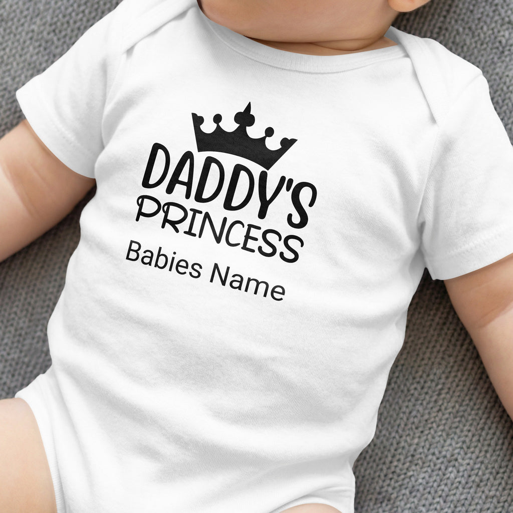 White baby onesie with "Daddy's PRINCESS" and "Babies Name" text.