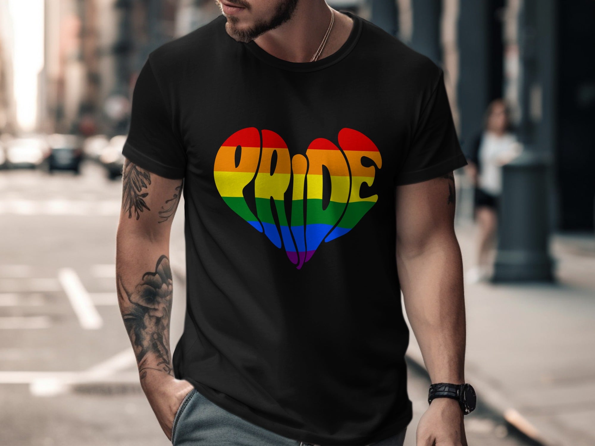 Black t-shirt with rainbow pride heart graphic and the word "Pride"