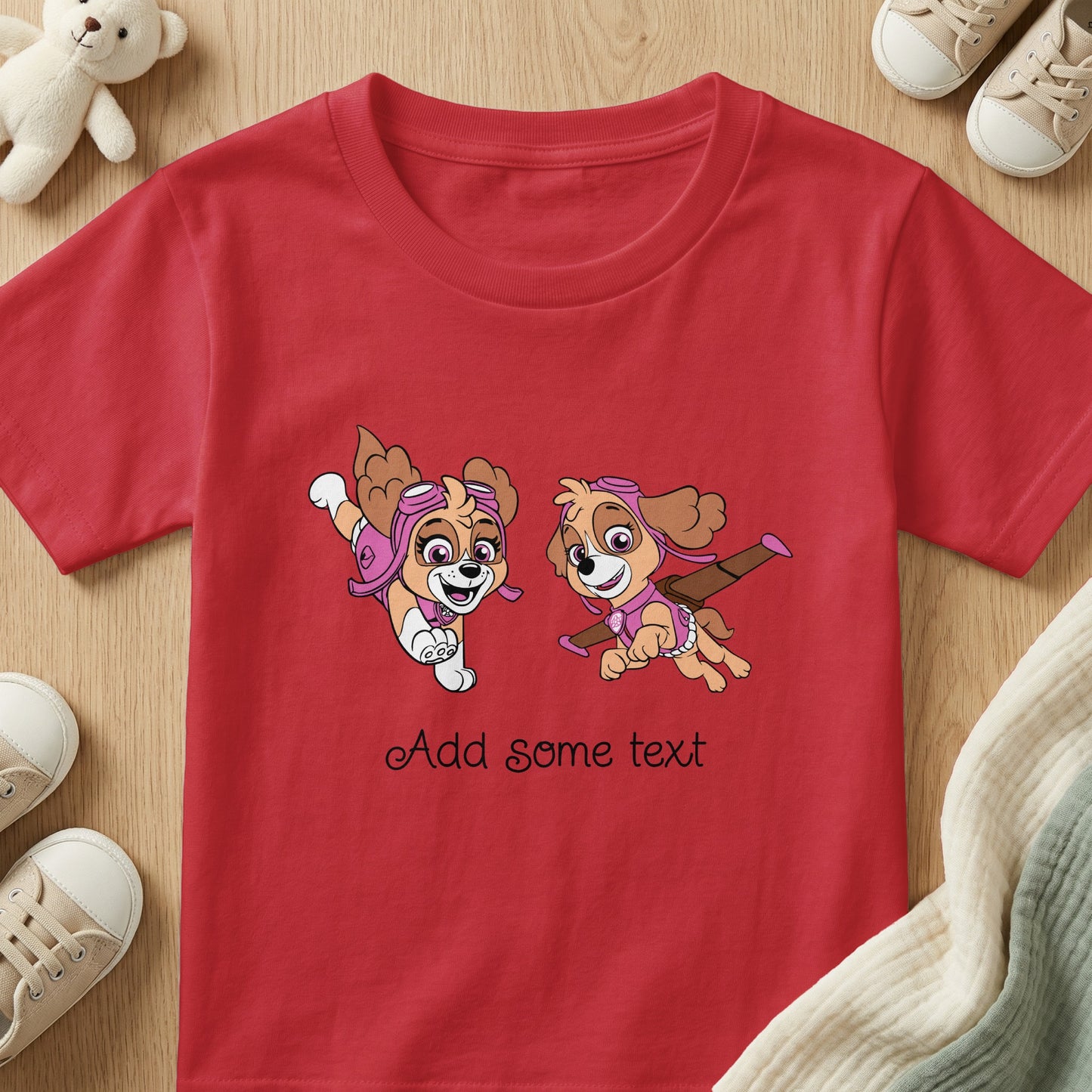Red t-shirt with two cartoon dogs and "Add some text" printed.