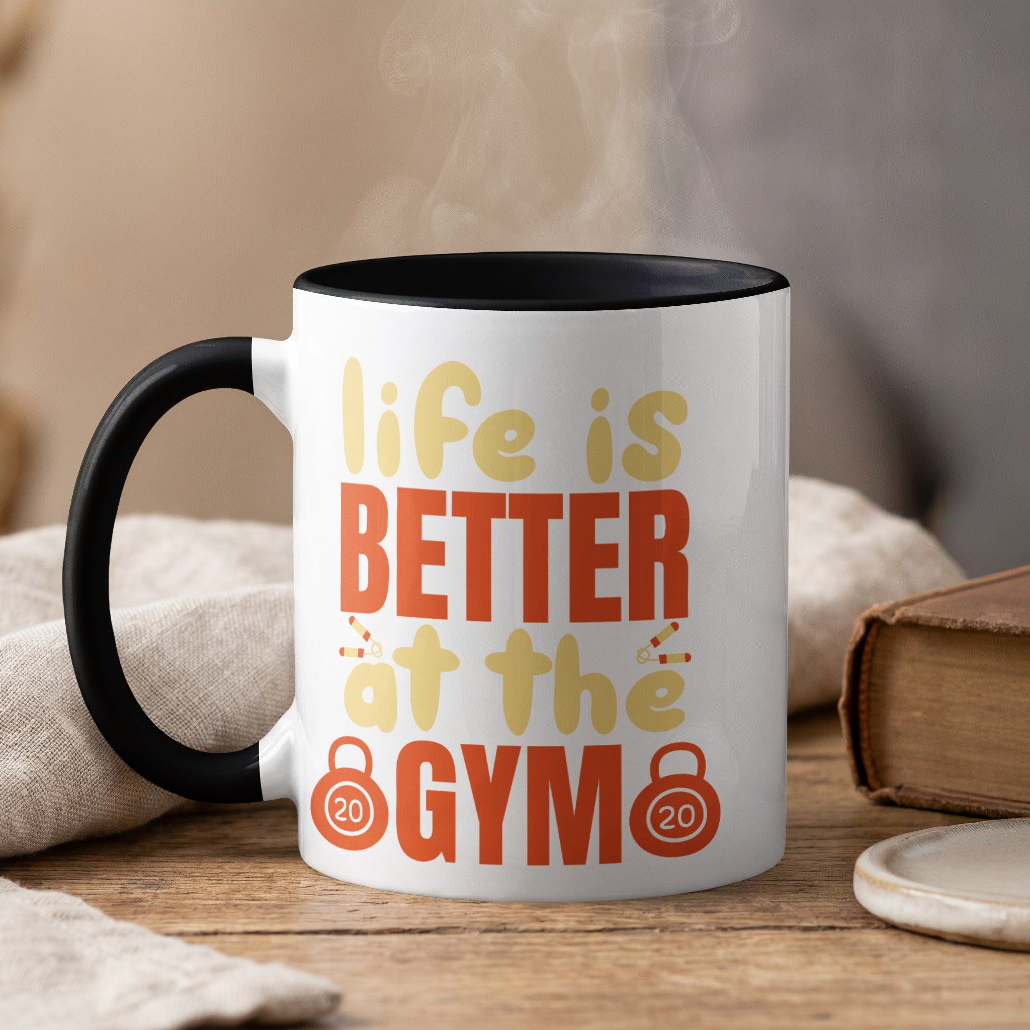 Mug with text "life is BETTER at the GYM" and barbell graphics.