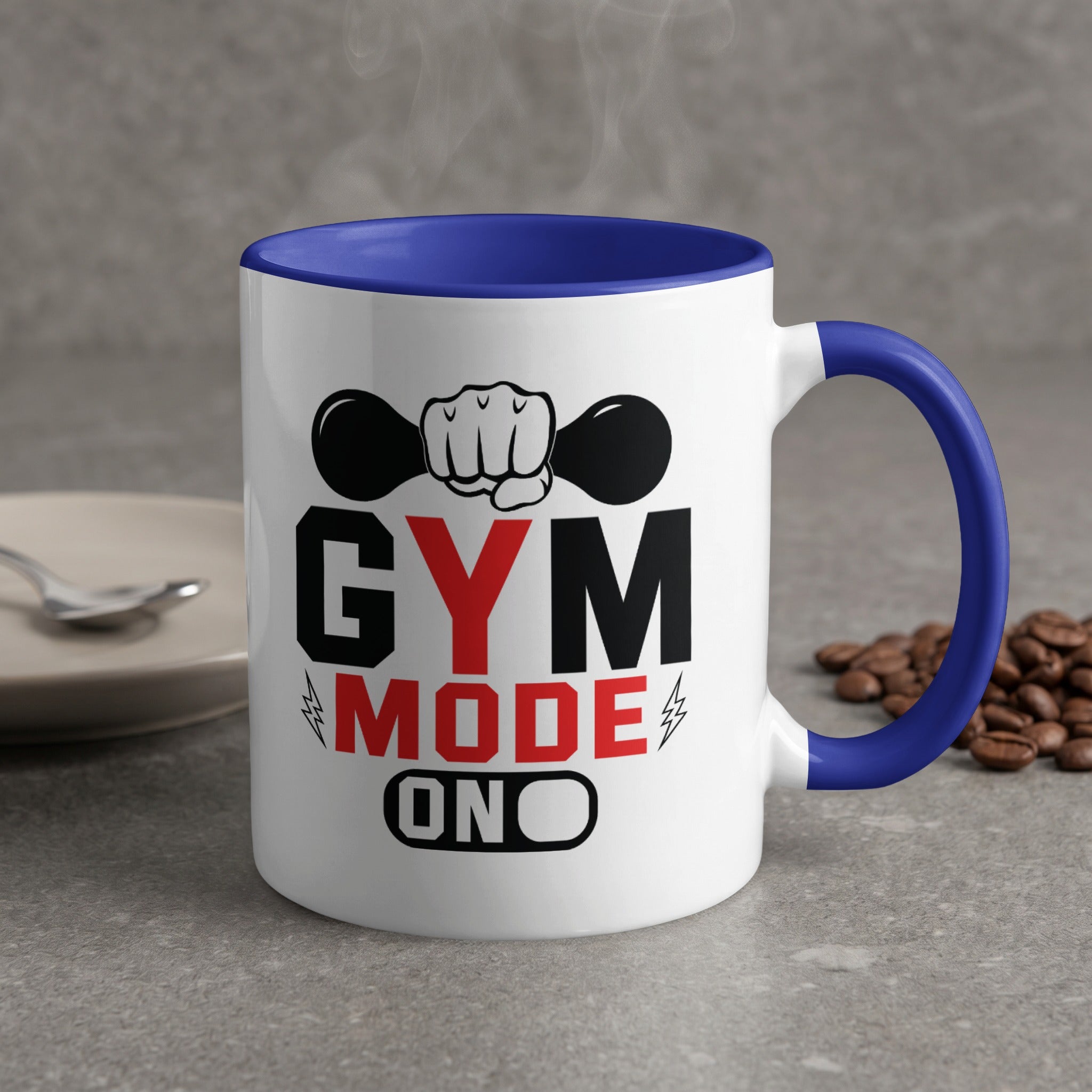 White mug with blue handle and "Gym Mode On" text.
