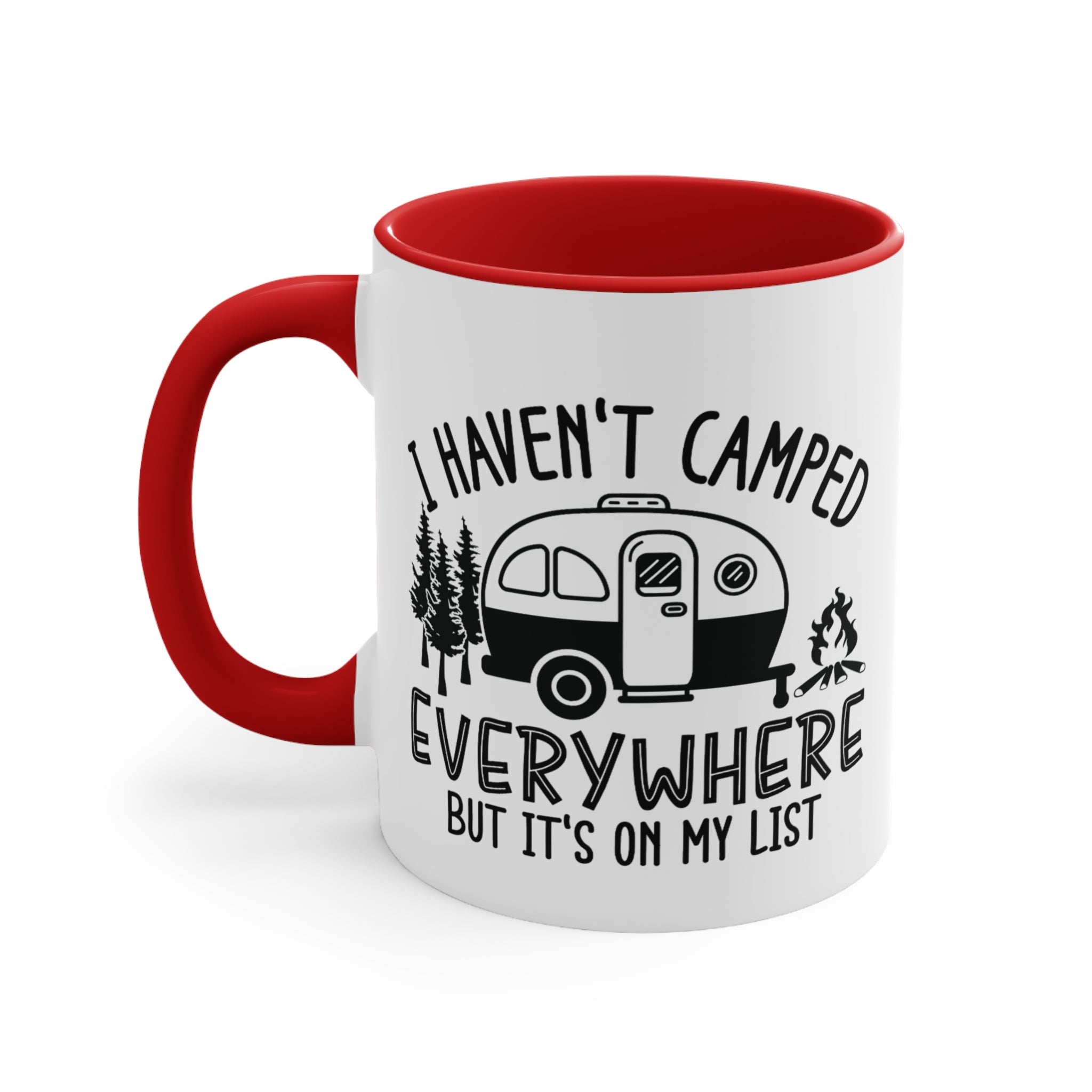 White mug with red handle and interior, featuring text and camping graphic.