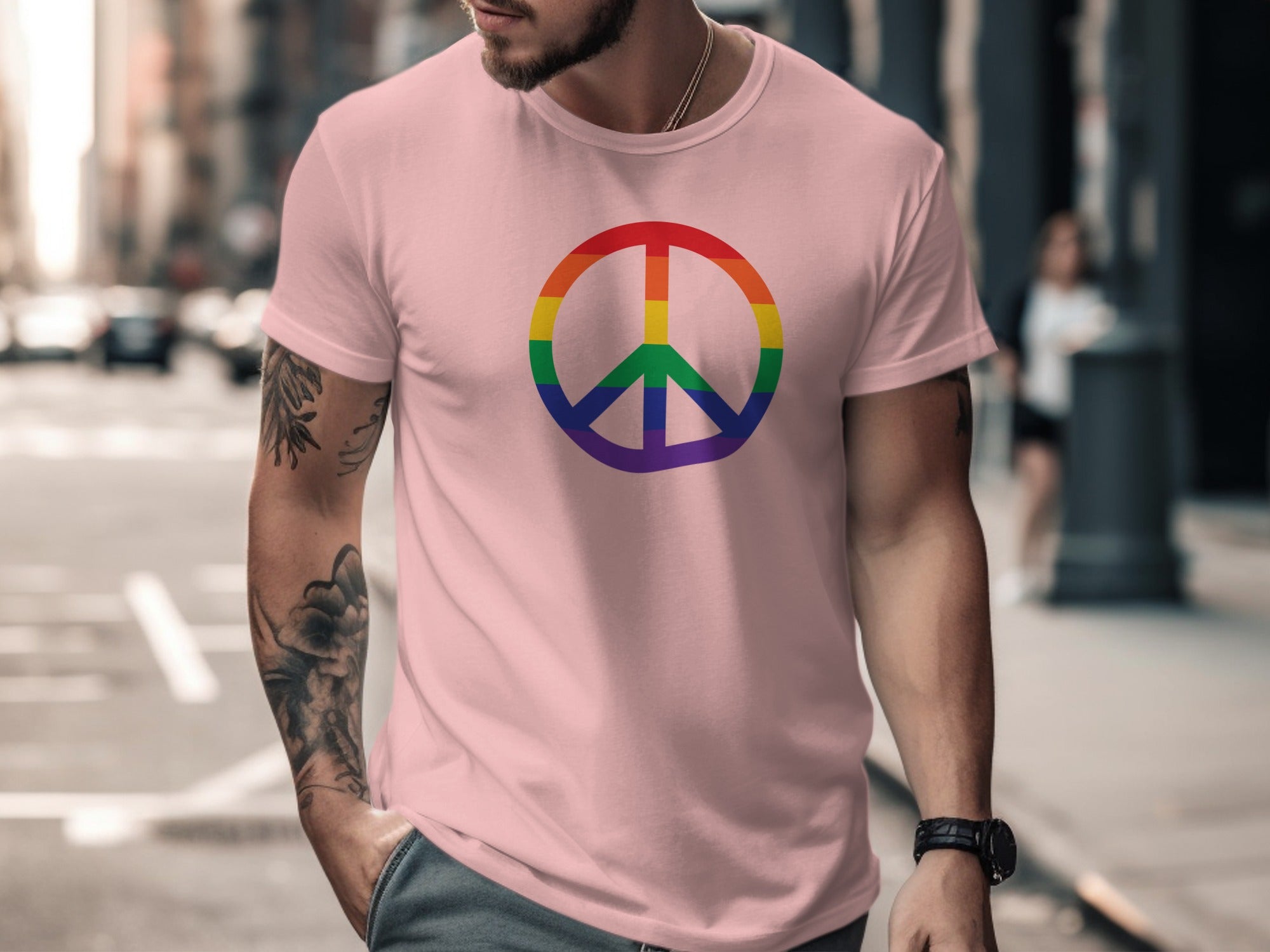 Pink t-shirt with rainbow peace sign graphic on chest.