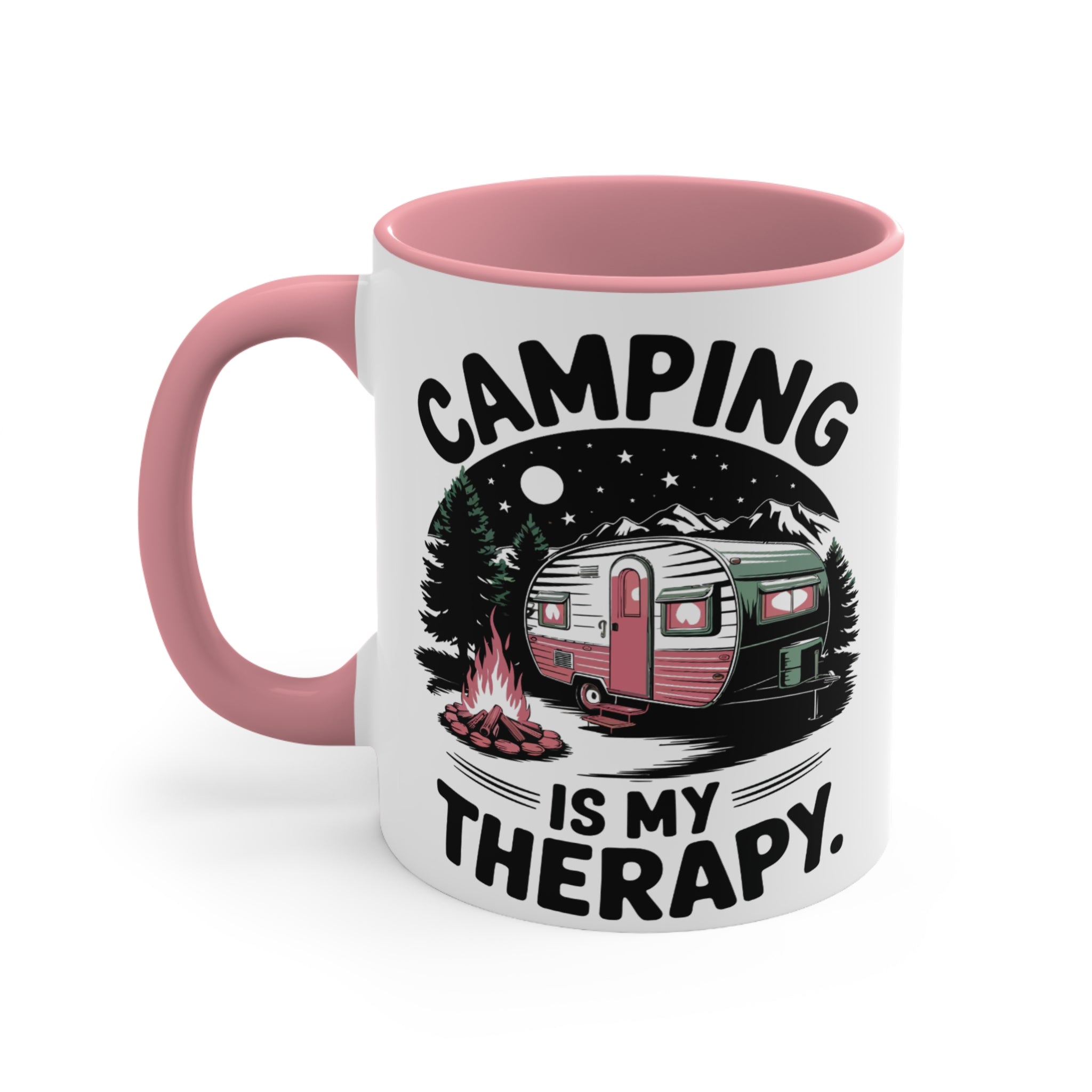 White mug with pink handle featuring "Camping Is My Therapy" with camper, campfire, and mountains.