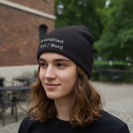Black ribbed beanie with "Personalised Text / Word" embroidered in white.