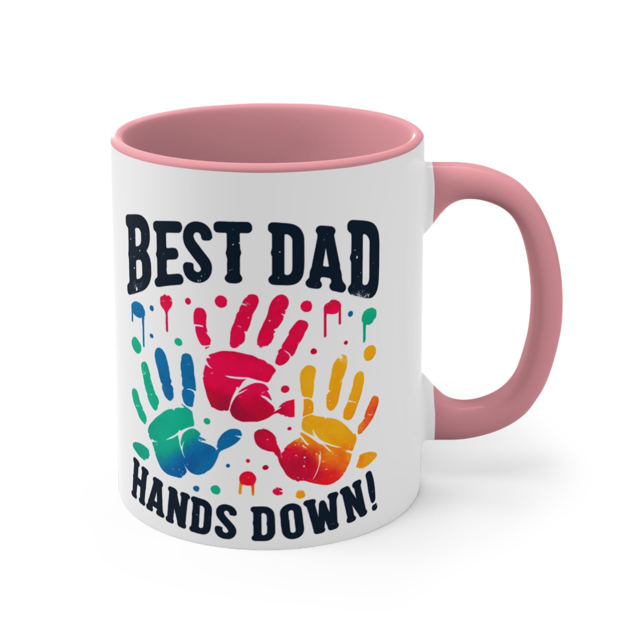 White mug with pink handle, colorful handprints, "Best Dad Hands Down!" text.