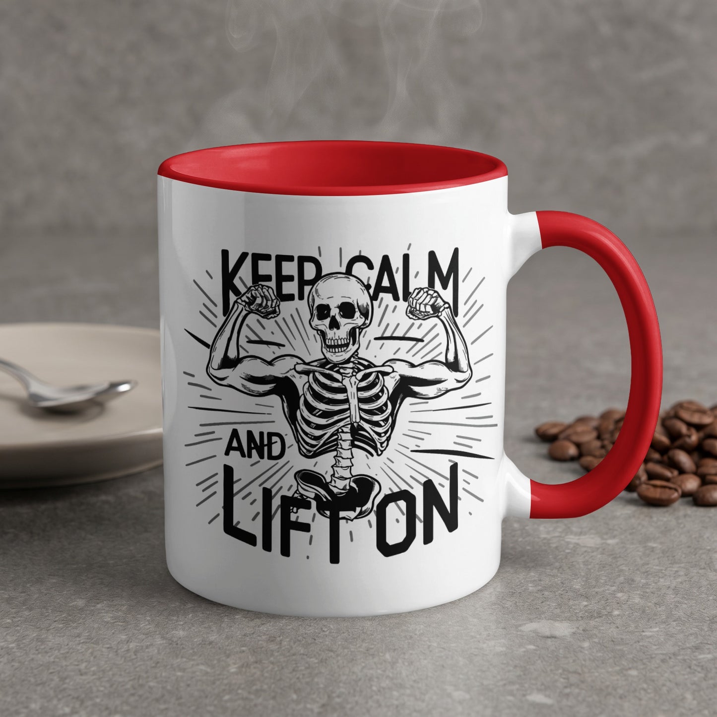 White mug with red handle, featuring a skeleton flexing and text "Keep Calm and Lift On".