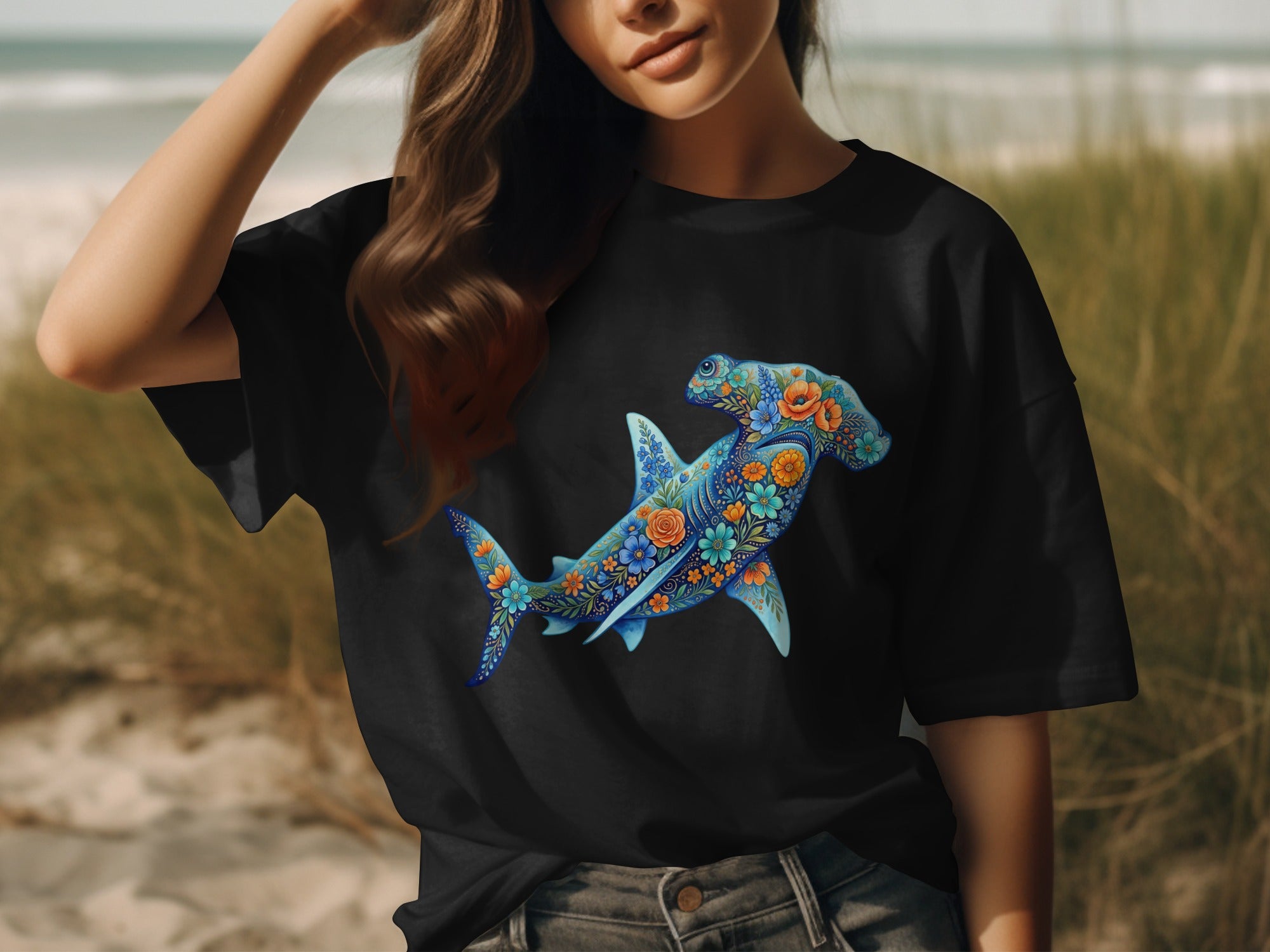 Black t-shirt featuring a blue hammerhead shark with a floral design.
