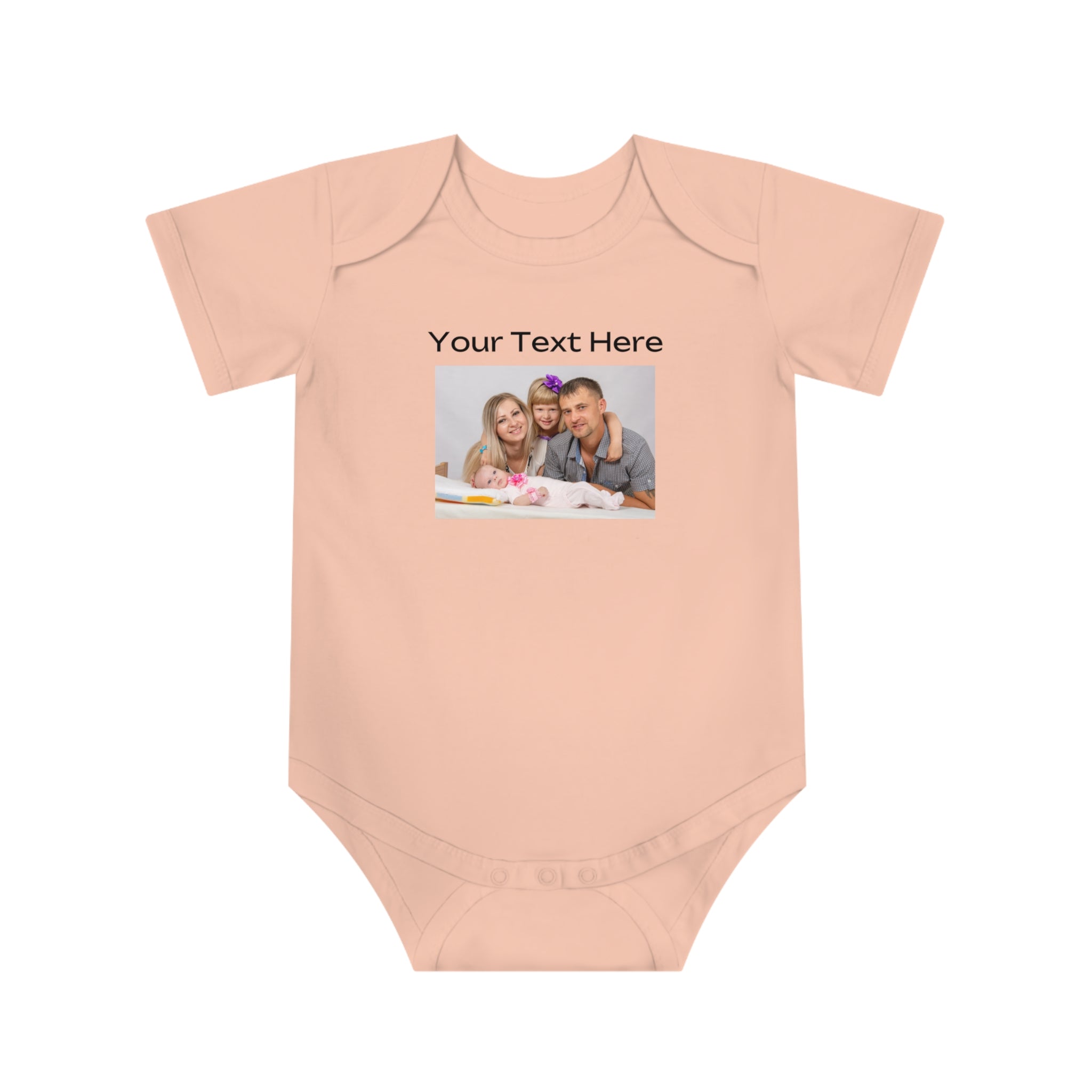 Peach baby onesie with custom family photo and "Your Text Here" title.