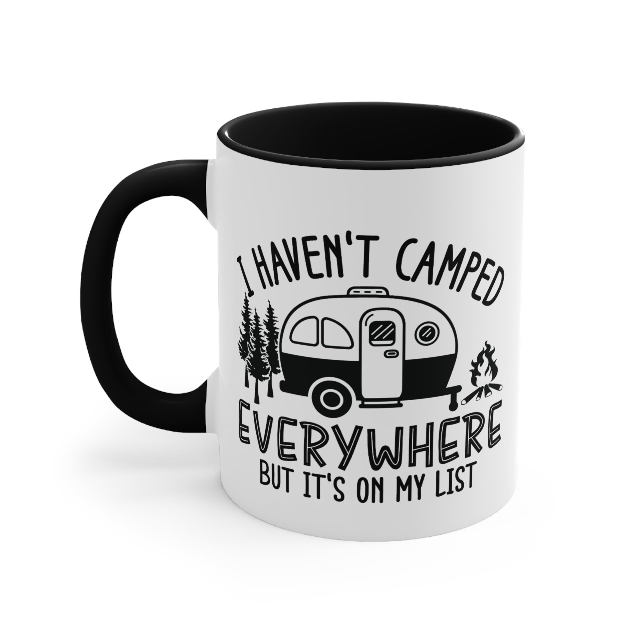 White mug with black handle and interior, featuring camping graphic and text.